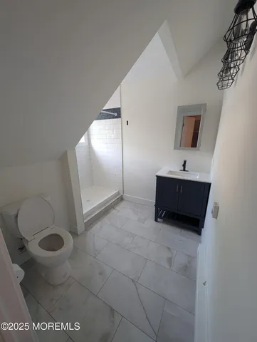 a bathroom with a sink and a toilet