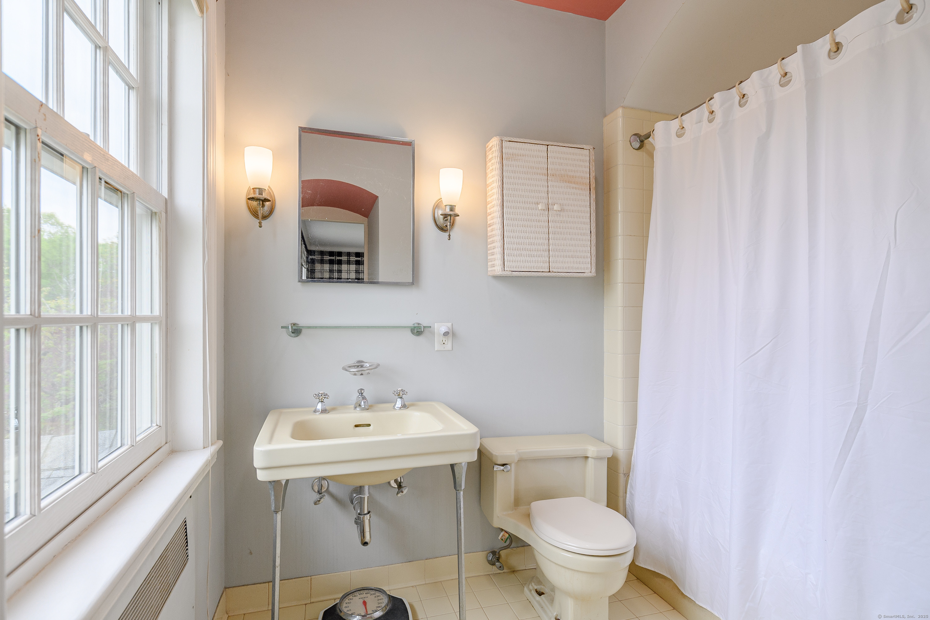 49 Great Ring Road Newtown, CT 06482 - Photo 1 of 40 a bathroom with a sink toilet and mirror