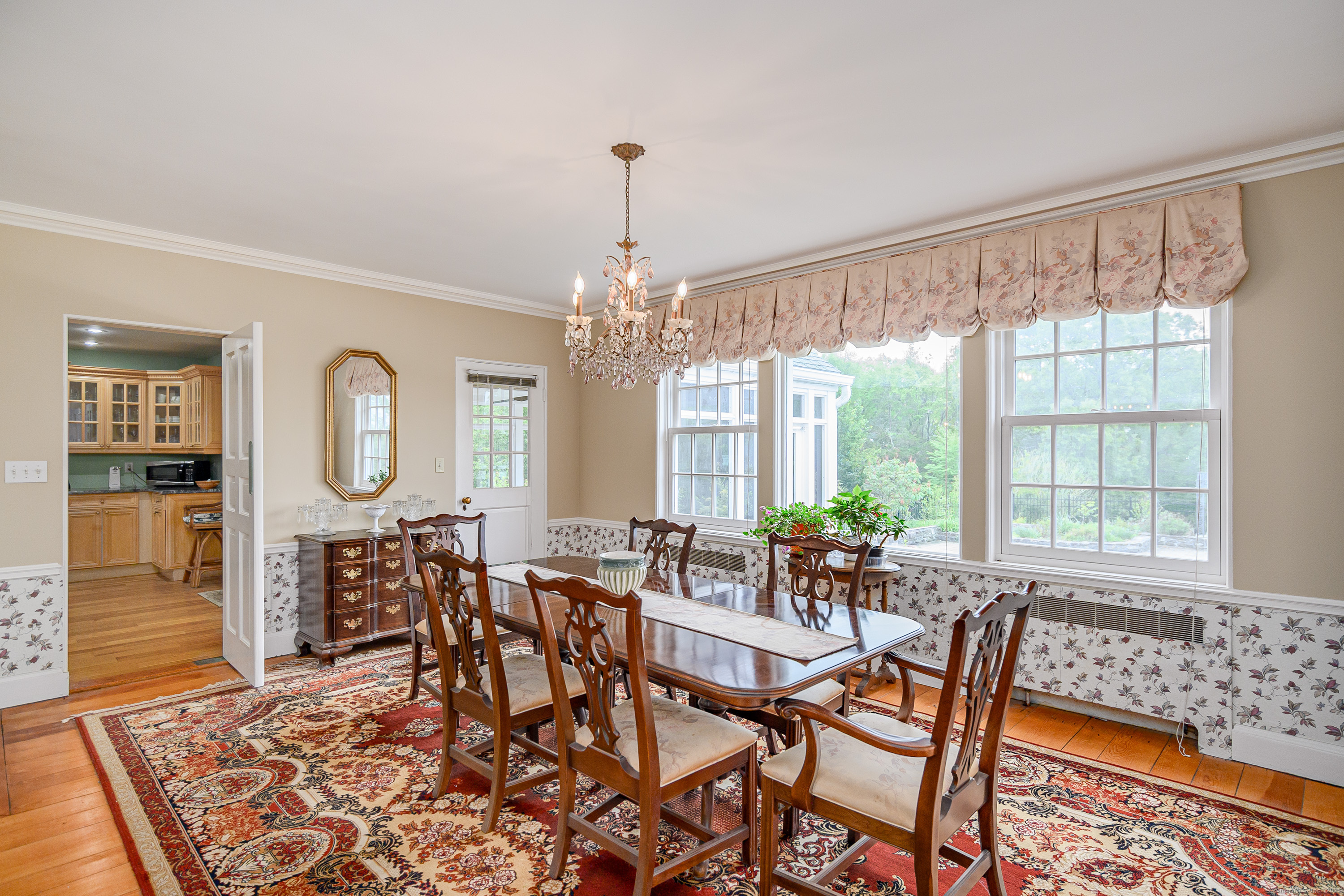 49 Great Ring Road Newtown, CT 06482 - Photo 12 of 40 a view of a dining room with furniture window and wooden floor