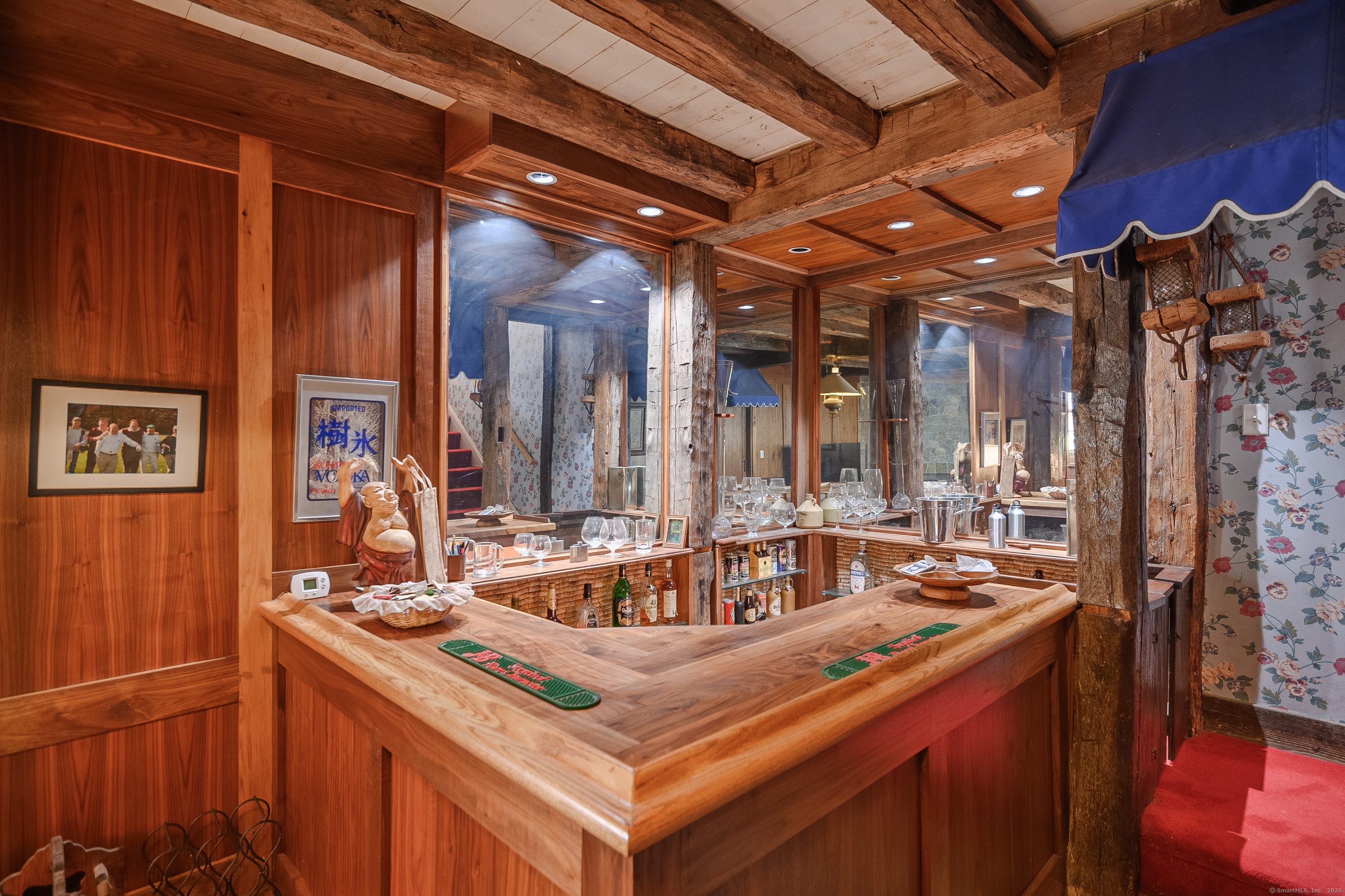 49 Great Ring Road Newtown, CT 06482 - Photo 19 of 40 a view of a bathroom with a sink and mirror with bathtub