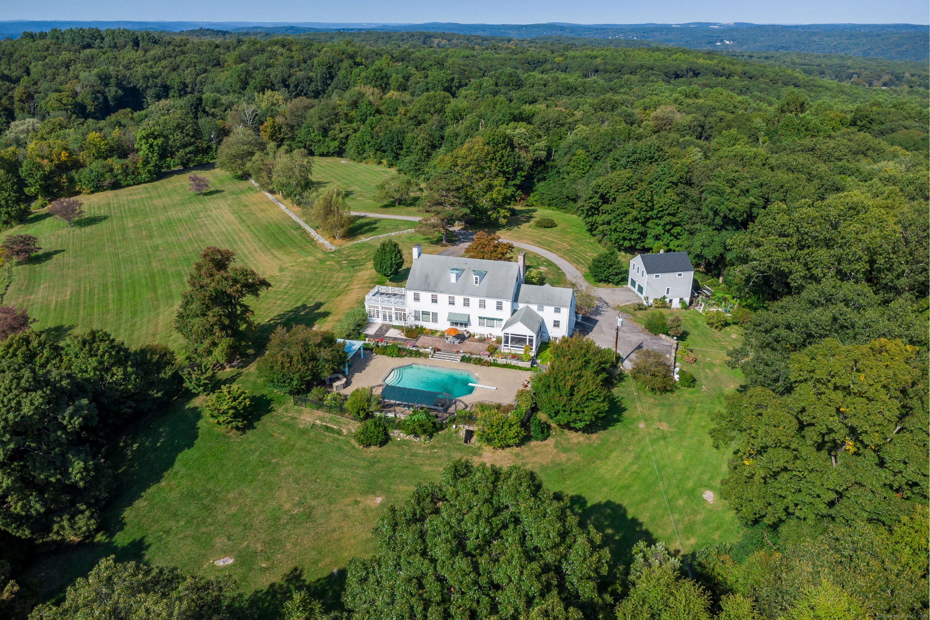 49 Great Ring Road Newtown, CT 06482 - Photo 25 of 40 a view of a house with a yard