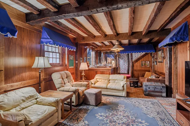 a outdoor space with patio lots of furniture and wooden floor