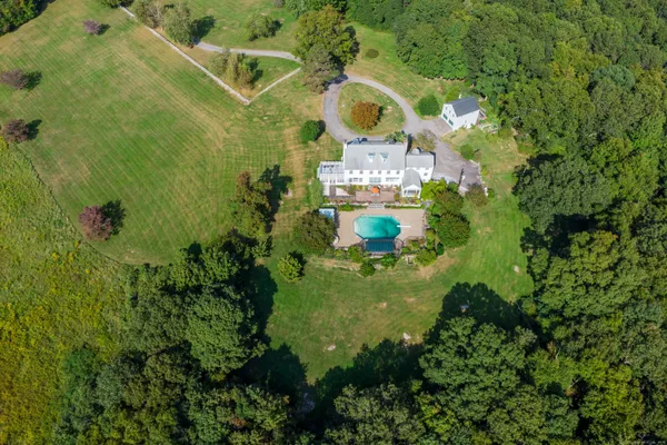 a view of a house with a swimming pool
