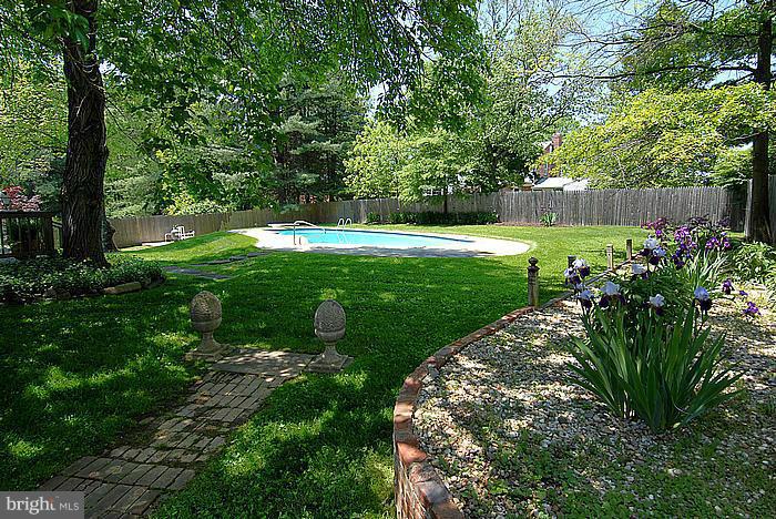 409 Highgate Terrace Silver Spring, MD 20904 - Photo 2 of 30 a view of a garden with a tree