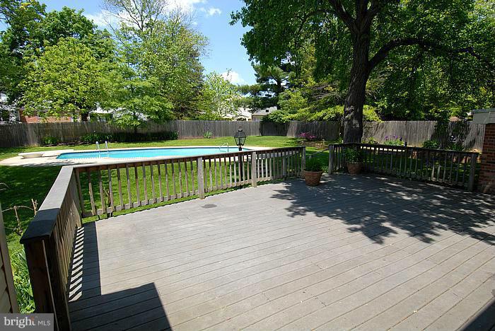 409 Highgate Terrace Silver Spring, MD 20904 - Photo 27 of 30 a view of deck with wooden floor and outdoor seating