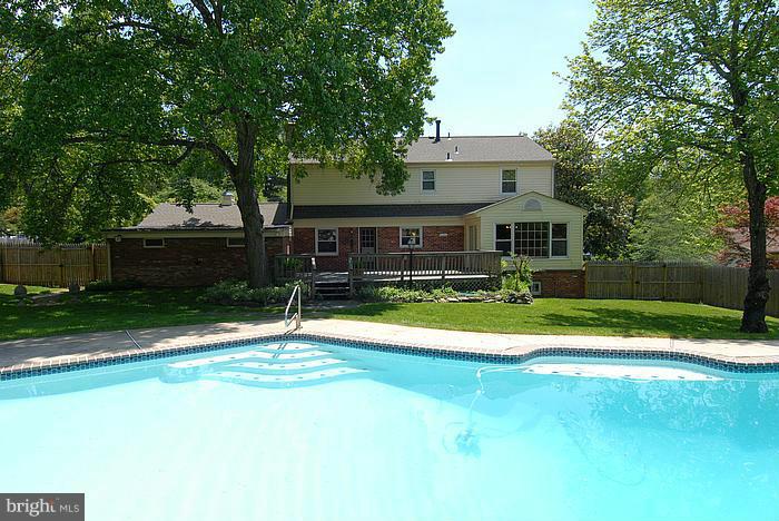409 Highgate Terrace Silver Spring, MD 20904 - Photo 29 of 30 a view of a house with swimming pool and a yard