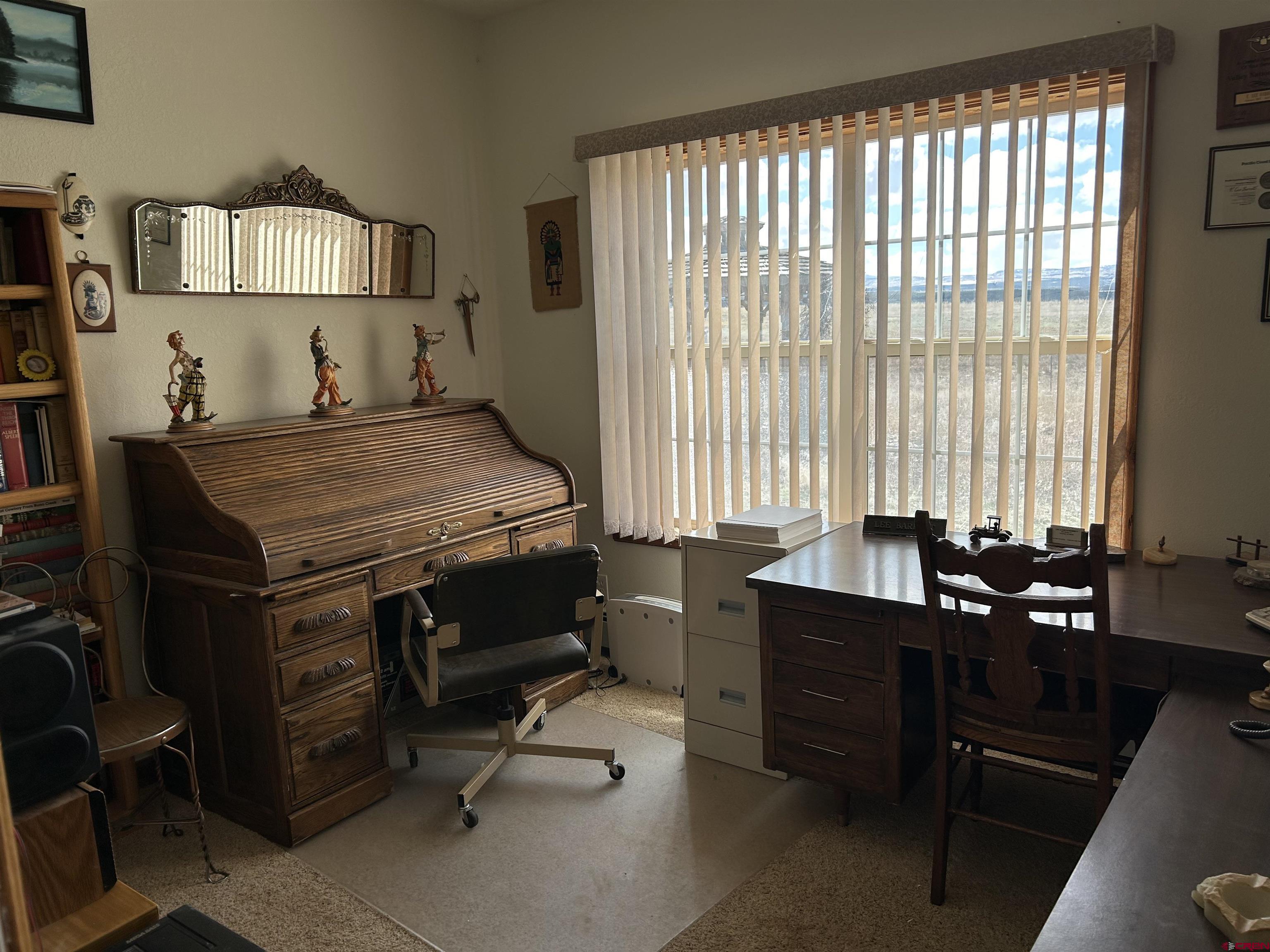 32116 Highway 145 Redvale, CO 81431 - Photo 15 of 28 a bedroom with a bed and a furniture