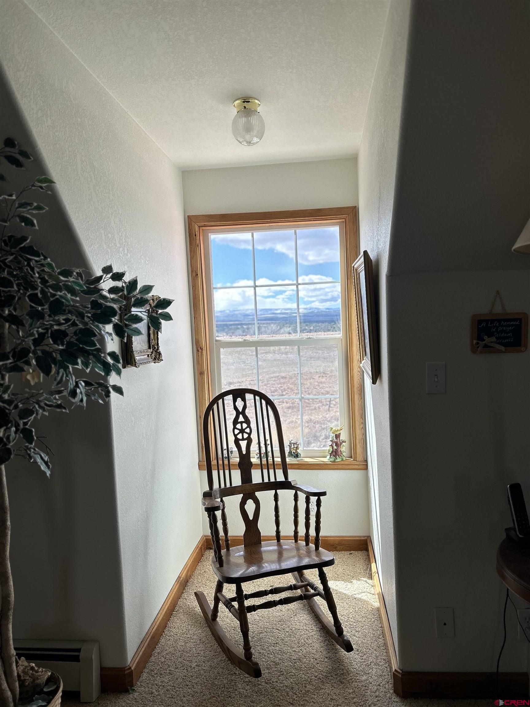32116 Highway 145 Redvale, CO 81431 - Photo 19 of 28 a view of a porch with furniture and a window