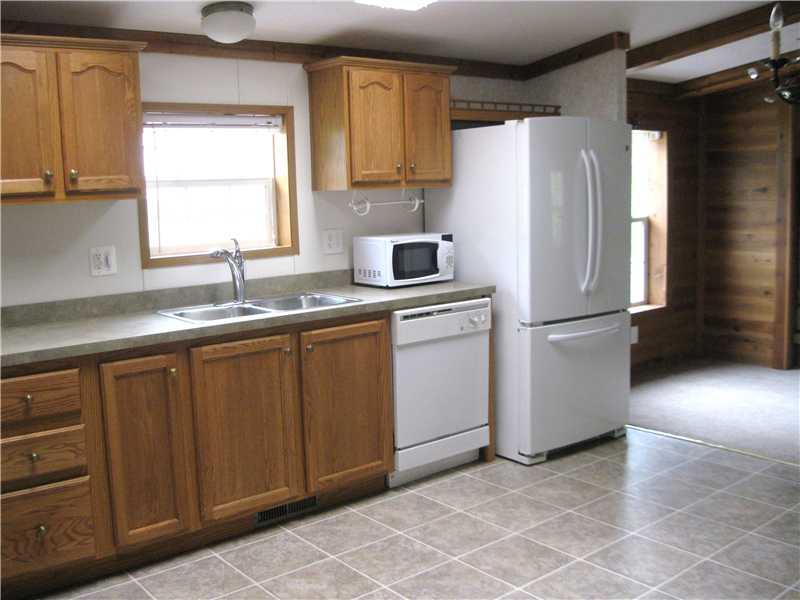 202 Rustic Ridge Lane Butler, PA 16002 - Photo 2 of 19 Kitchen. Clean, beautiful, & very functional eat-in kitchen includes the appliances, dishwasher, garbage disposal, refrigerator, and stove.