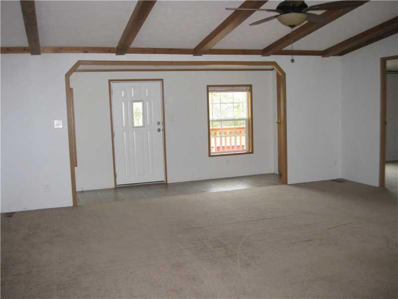 202 Rustic Ridge Lane Butler, PA 16002 - Photo 5 of 19 Living Room. Living room is spacious, clean, and neutral. This home is immaculate throughout.