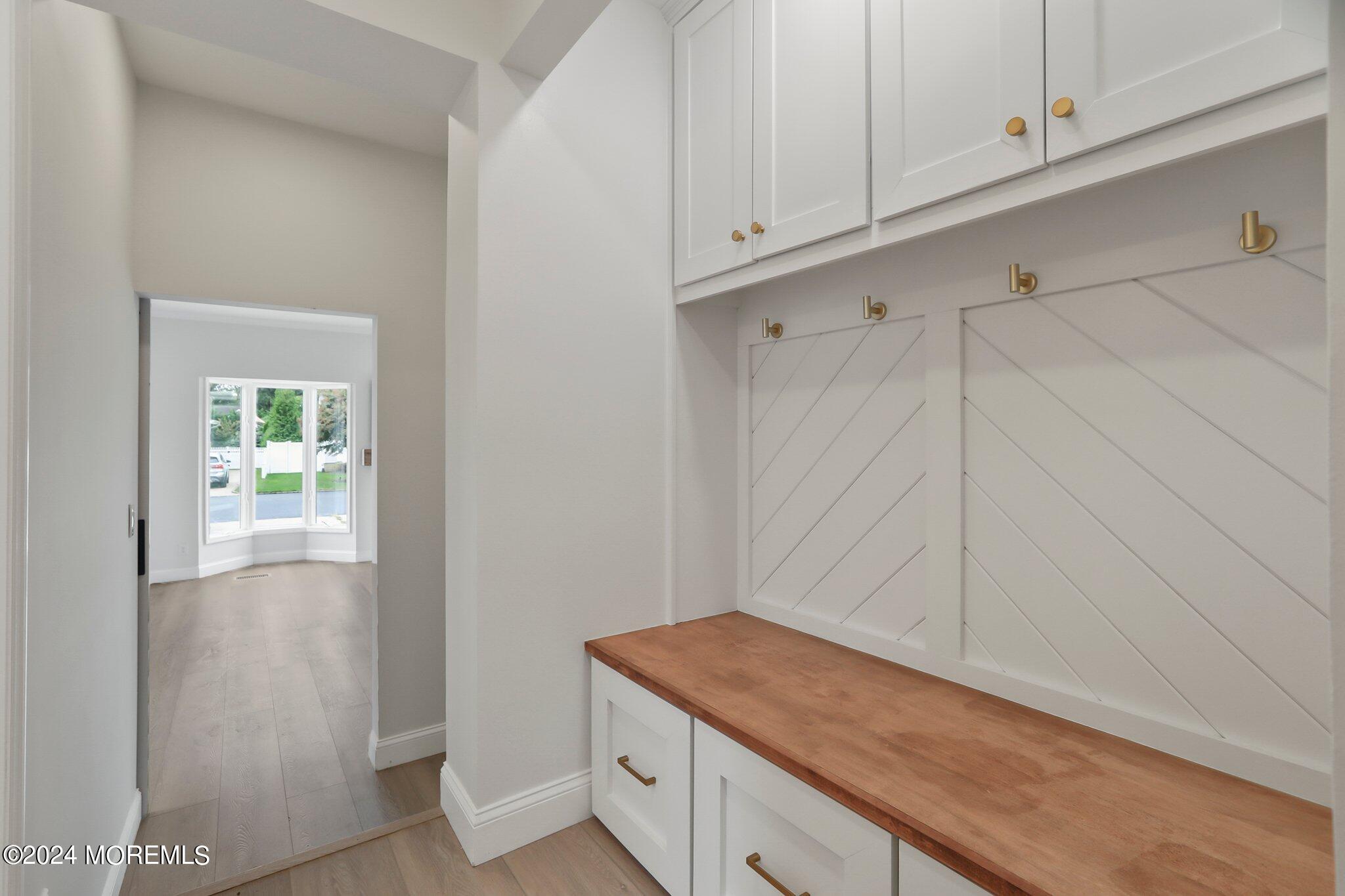 1419 Joseph Street Point Pleasant, NJ 08742 - Photo 16 of 27 a utility room with cabinets
