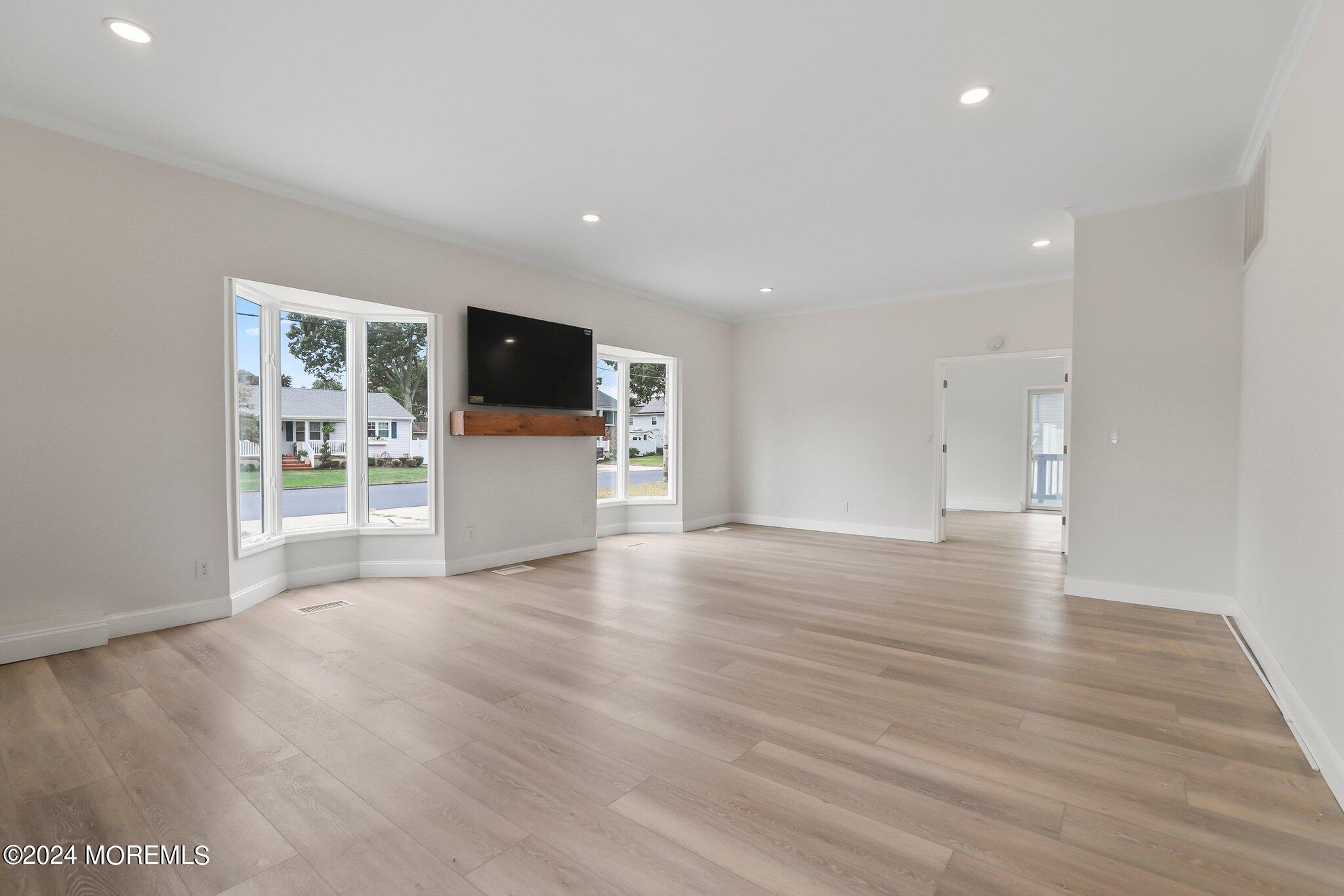 1419 Joseph Street Point Pleasant, NJ 08742 - Photo 17 of 27 a view of a livingroom with a furniture and wooden floor