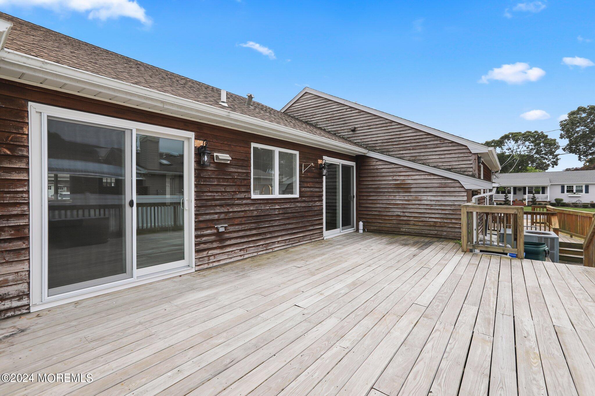 1419 Joseph Street Point Pleasant, NJ 08742 - Photo 25 of 27 a view of deck with wooden floor and fence