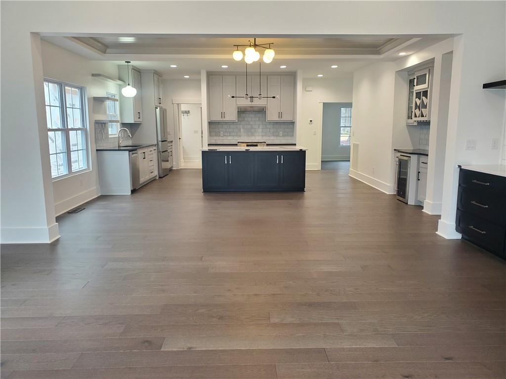1240 6th Street Northwest Hickory, NC 28601 - Photo 13 of 48 a large kitchen with cabinets and stainless steel appliances
