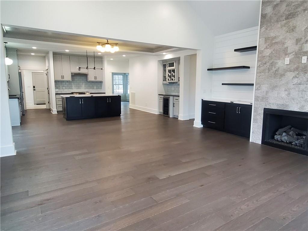 1240 6th Street Northwest Hickory, NC 28601 - Photo 21 of 48 a large en suite bathroom with a sink and a large mirror