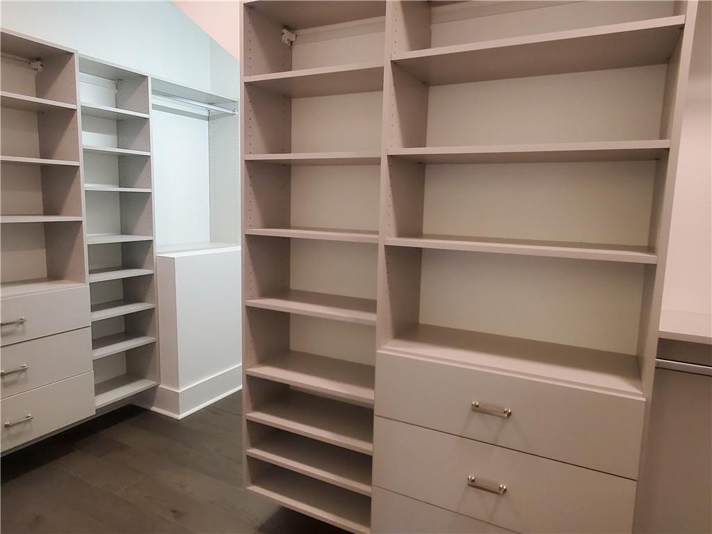 1240 6th Street Northwest Hickory, NC 28601 - Photo 25 of 48 a view of walk in closet with empty racks