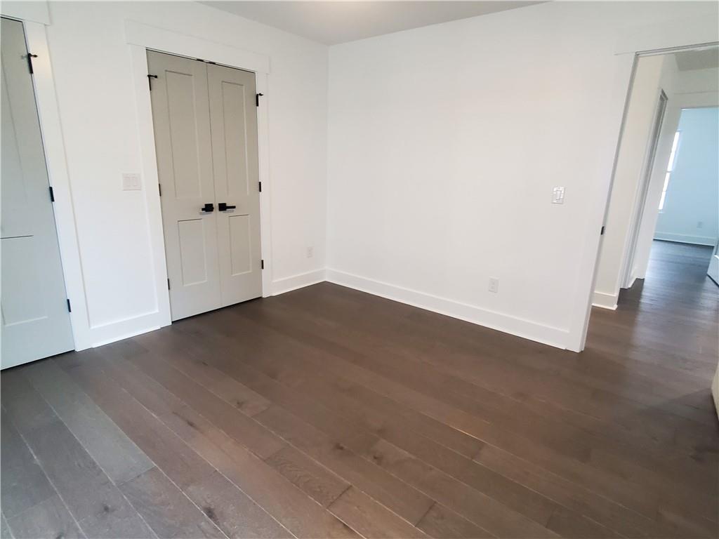 1240 6th Street Northwest Hickory, NC 28601 - Photo 31 of 48 a view of an empty room with wooden floor