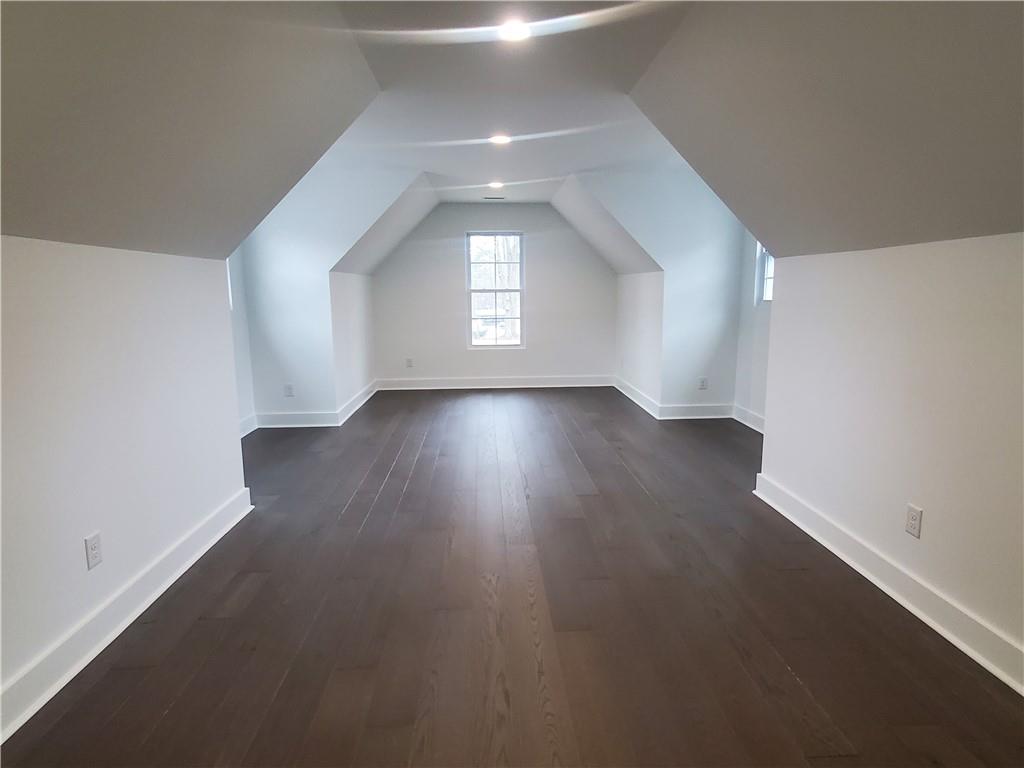 1240 6th Street Northwest Hickory, NC 28601 - Photo 35 of 48 an empty room with wooden floor and windows