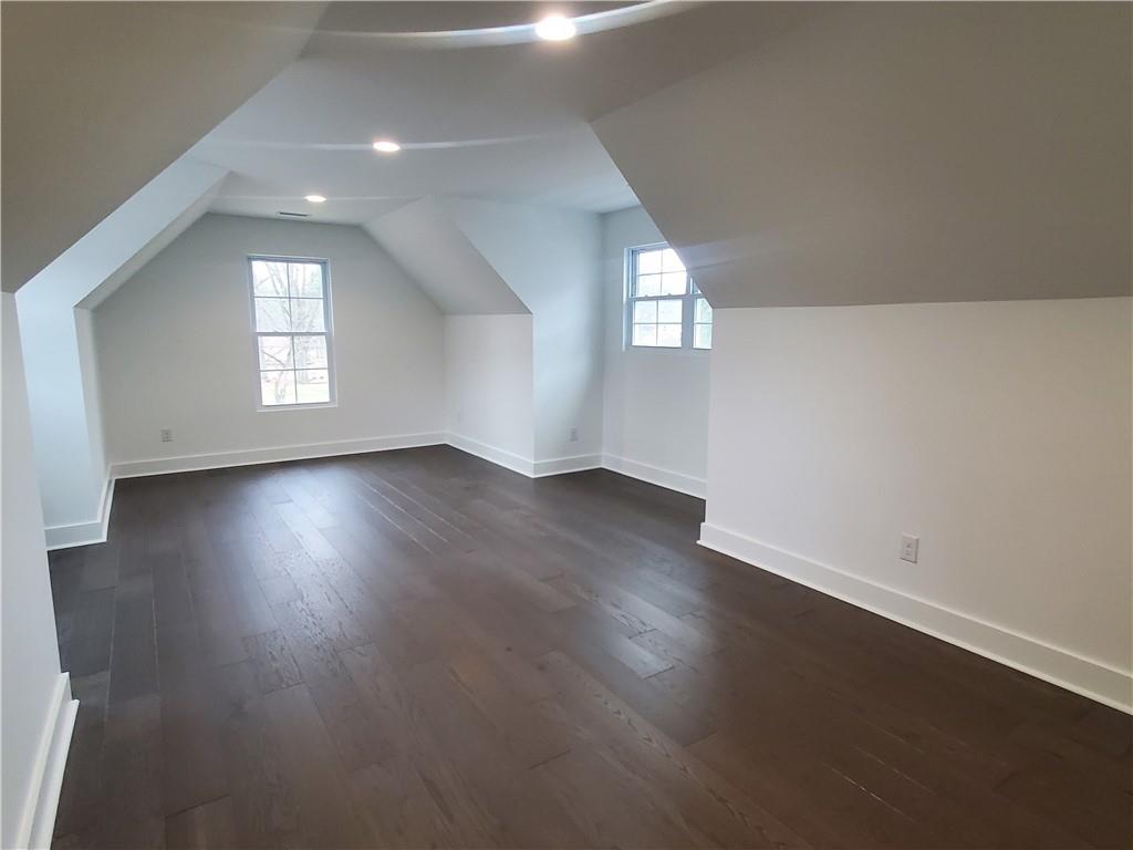 1240 6th Street Northwest Hickory, NC 28601 - Photo 36 of 48 an empty room with wooden floor and windows