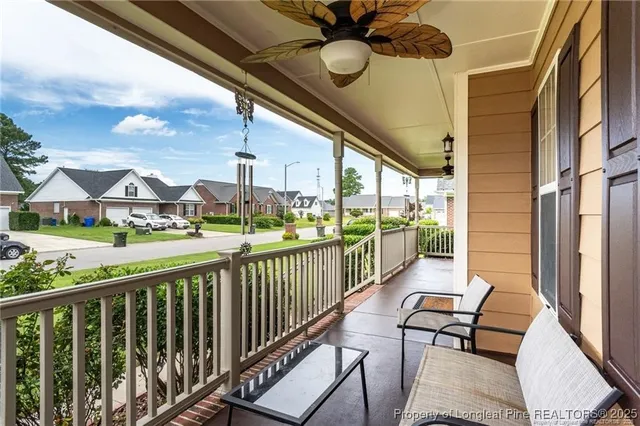 a view of balcony with furniture