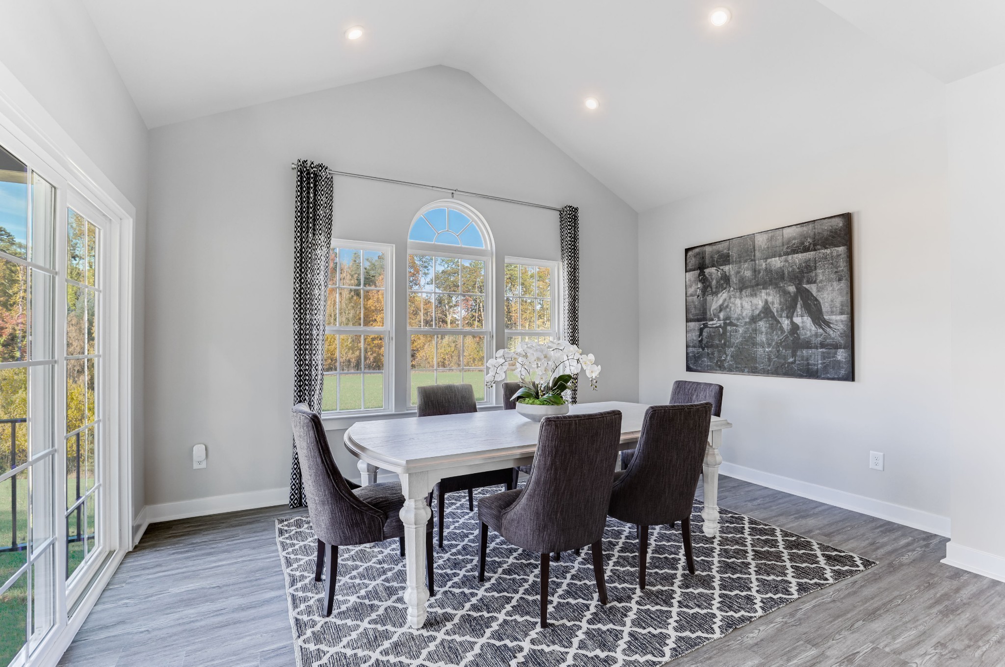 4032 Oglethorpe Drive Franklin, TN 37064 - Photo 11 of 34 a view of a dining room with furniture window and wooden floor
