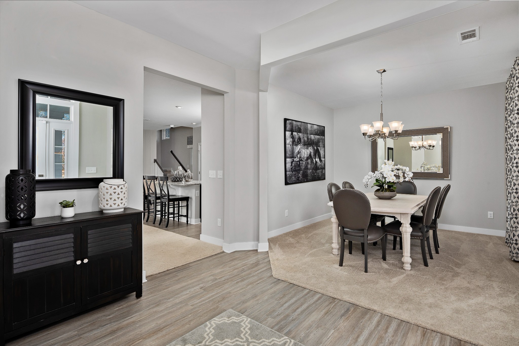4032 Oglethorpe Drive Franklin, TN 37064 - Photo 12 of 34 a view of a dining room with furniture and chandelier