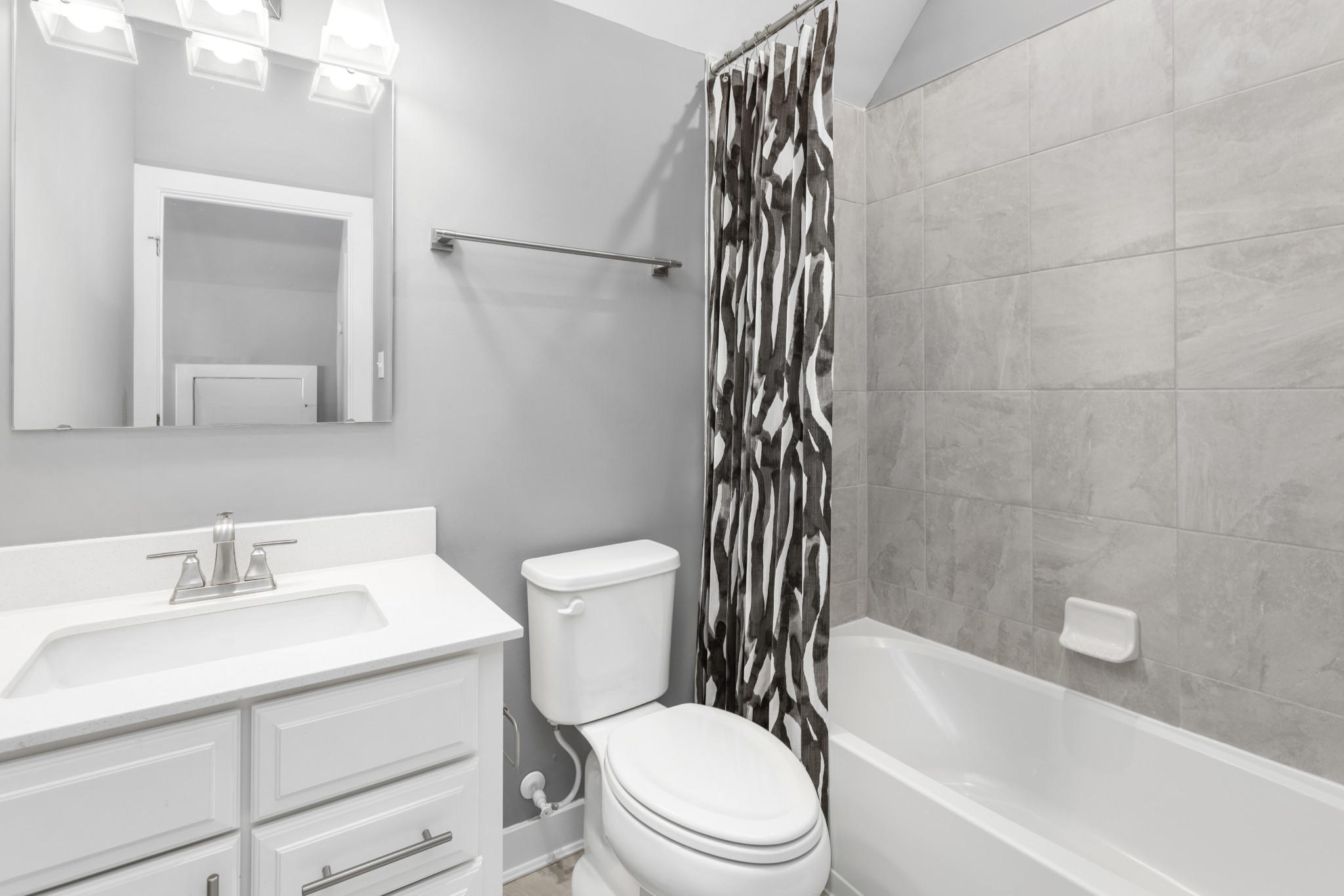 4032 Oglethorpe Drive Franklin, TN 37064 - Photo 22 of 34 a bathroom with a sink toilet and shower