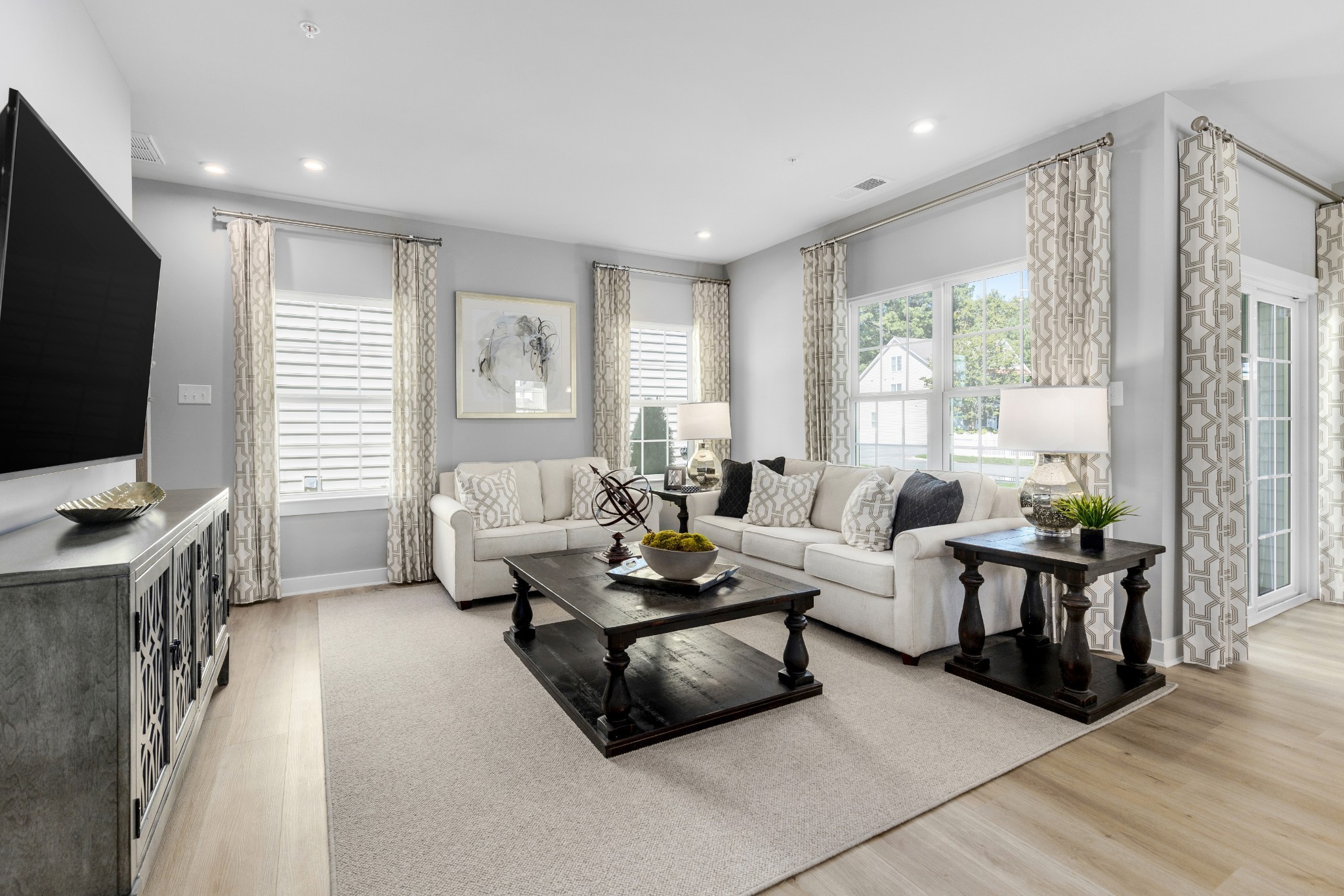 4032 Oglethorpe Drive Franklin, TN 37064 - Photo 27 of 34 a living room with furniture and a flat screen tv