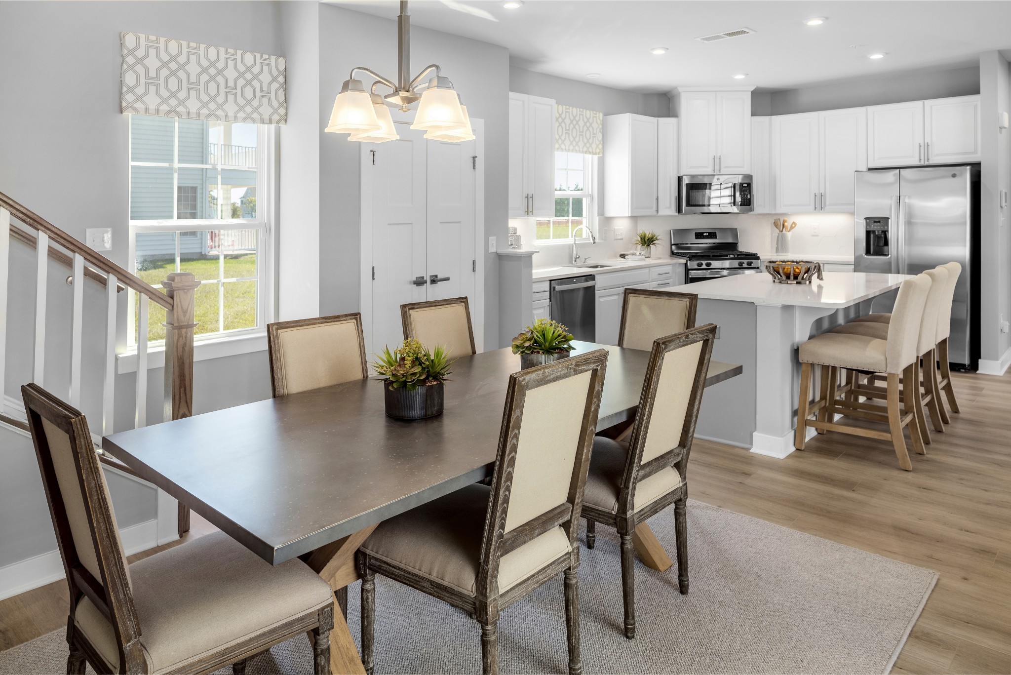 4032 Oglethorpe Drive Franklin, TN 37064 - Photo 30 of 34 a view of a dining room with furniture and wooden floor