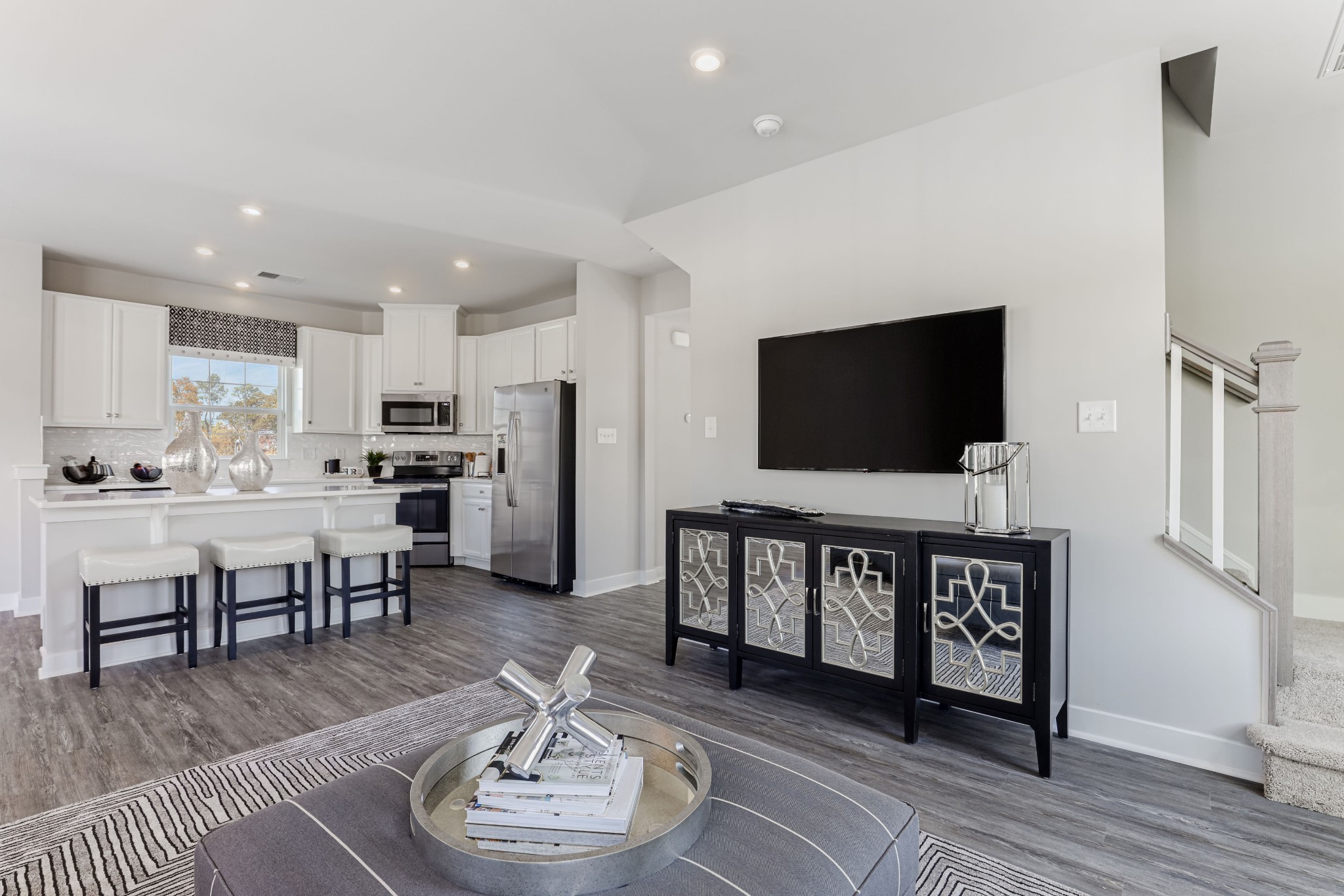 4032 Oglethorpe Drive Franklin, TN 37064 - Photo 7 of 34 a living room with furniture and a flat screen tv