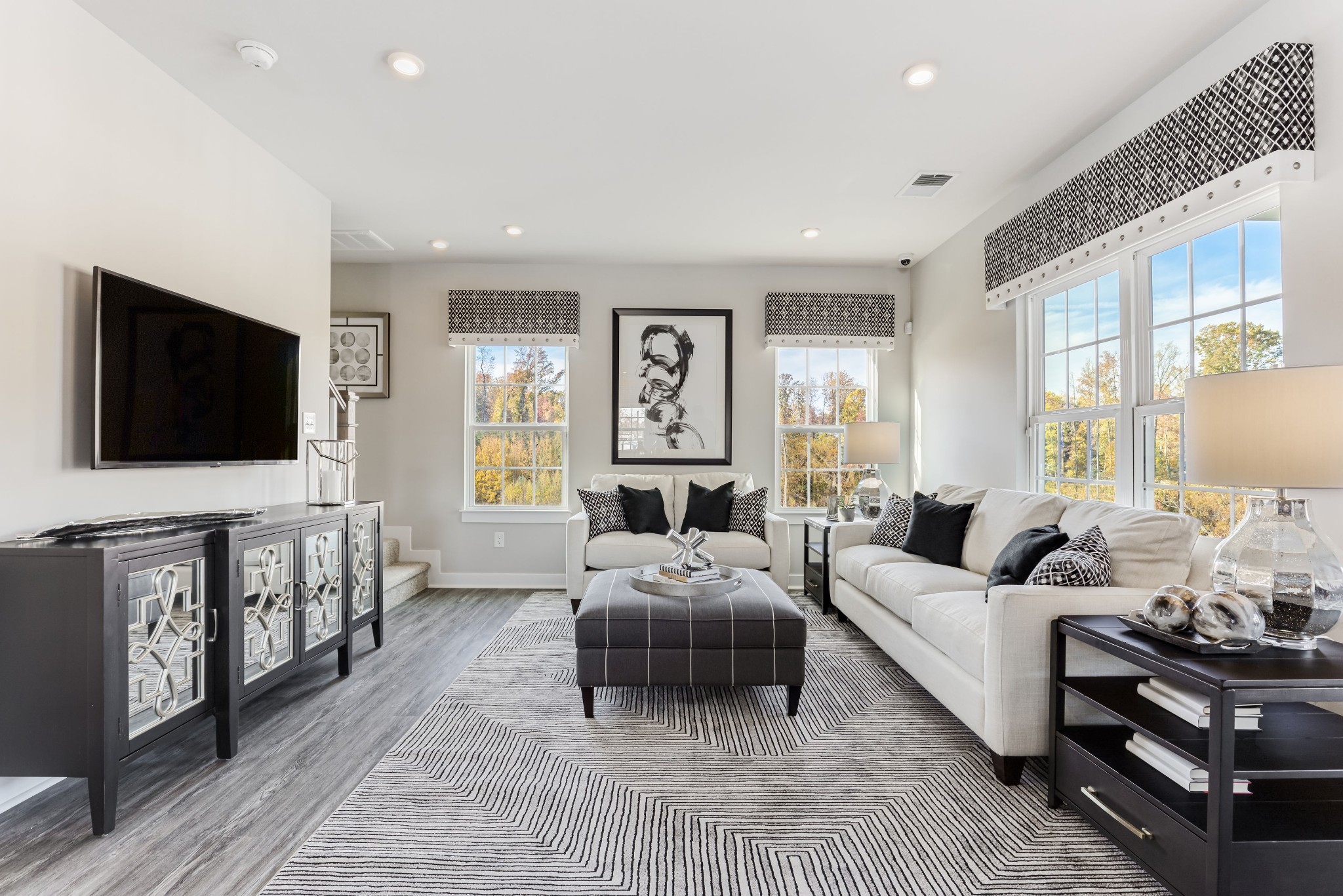 4032 Oglethorpe Drive Franklin, TN 37064 - Photo 8 of 34 a living room with furniture and a flat screen tv