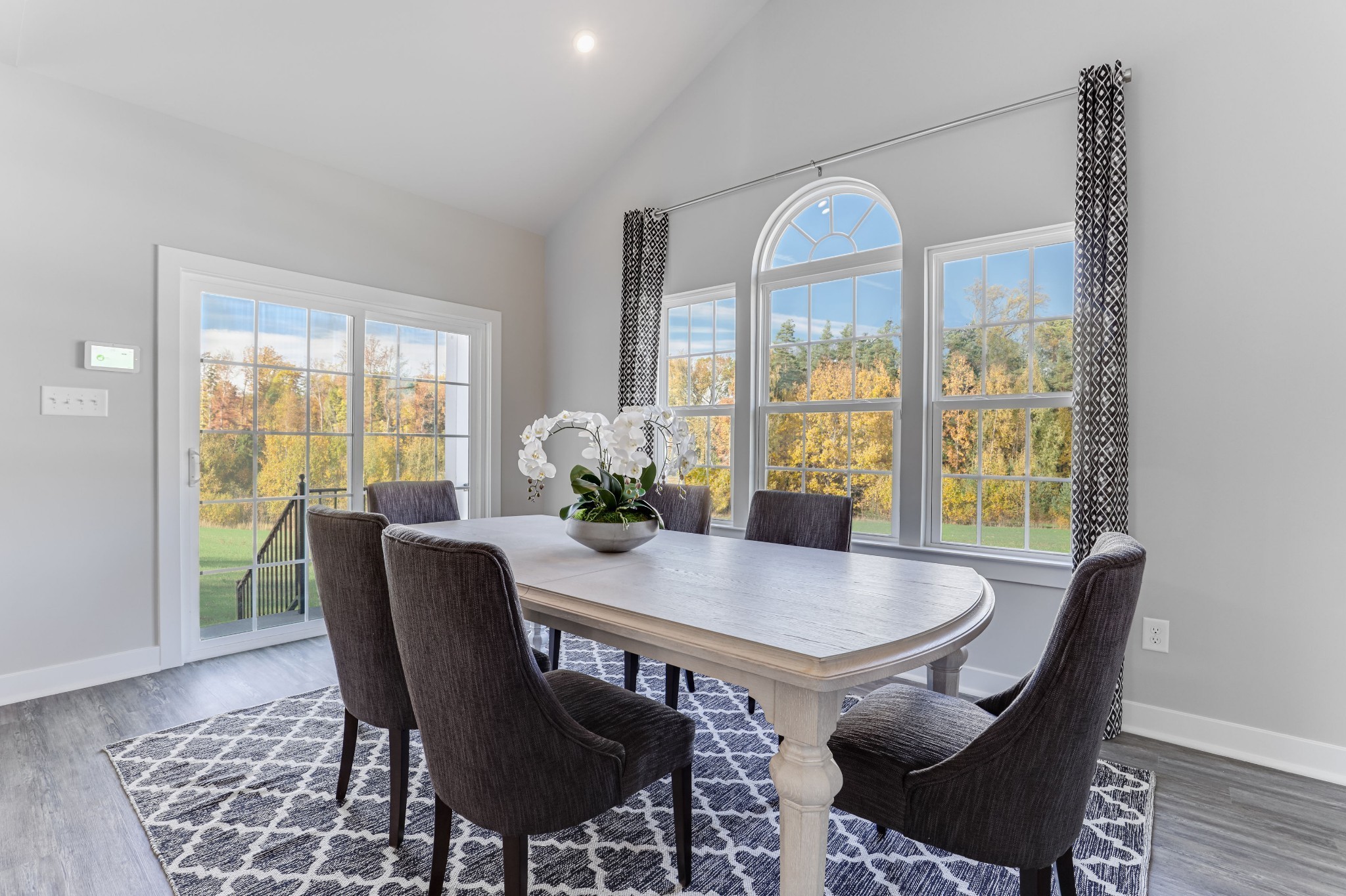 4032 Oglethorpe Drive Franklin, TN 37064 - Photo 9 of 34 a view of a dining room with furniture window and wooden floor