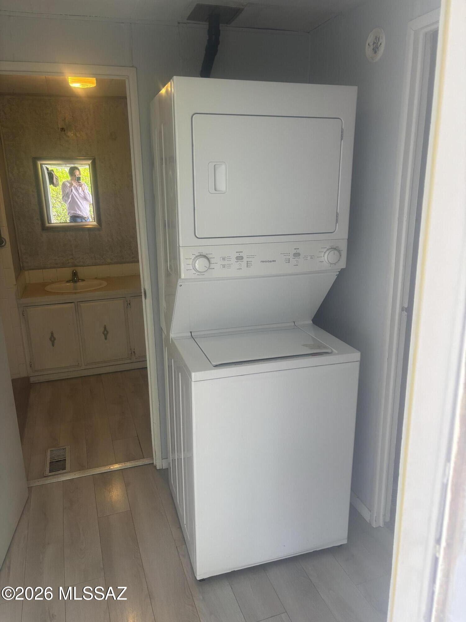 4550 North Flowing Wells Road, Unit 65 Tucson, AZ 85705 - Photo 19 of 50 a utility room with dryer and washer