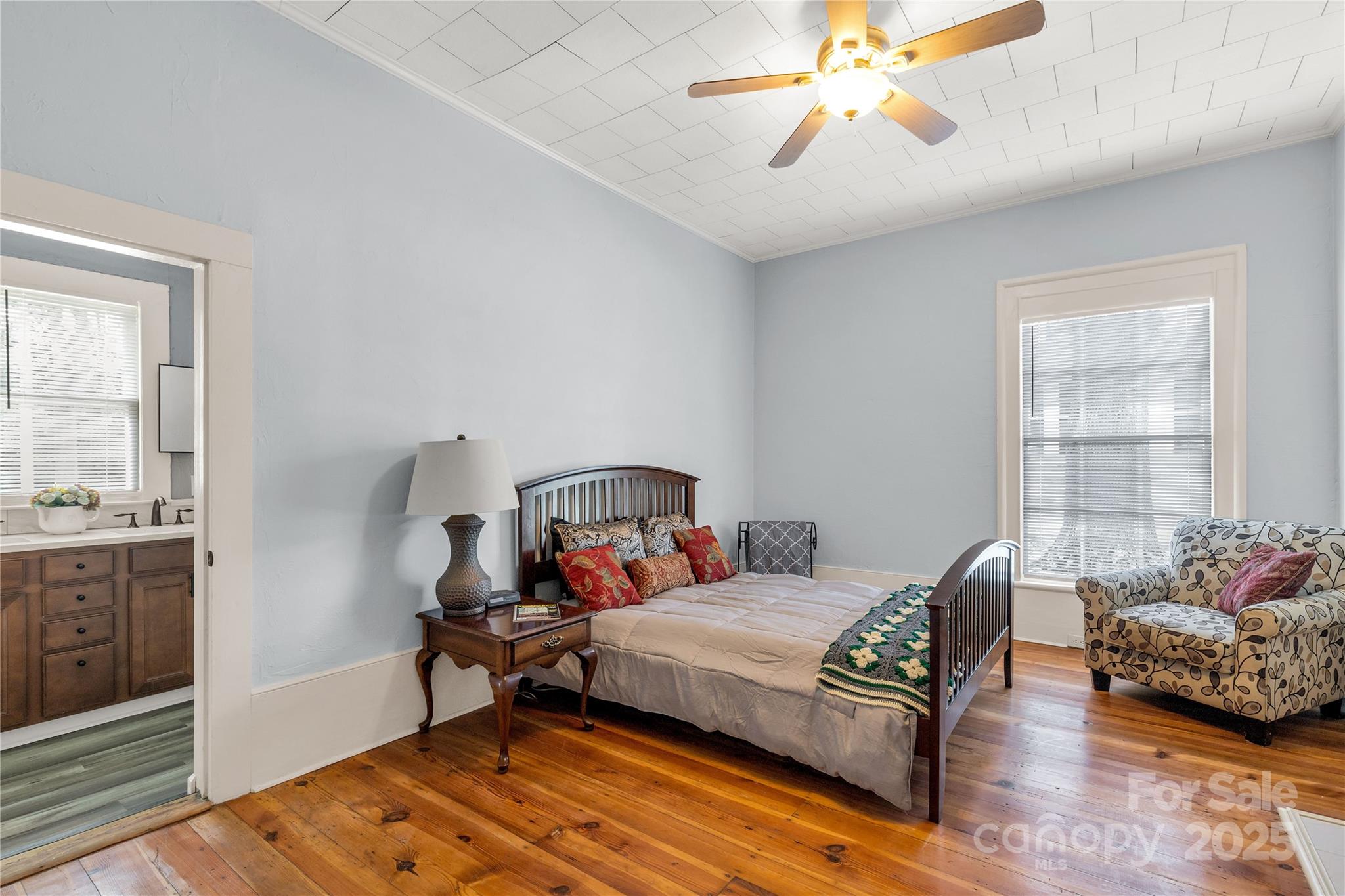 203 Kings Mountain Street Clover, SC 29710 - Photo 14 of 35 a bedroom with furniture and wooden floor