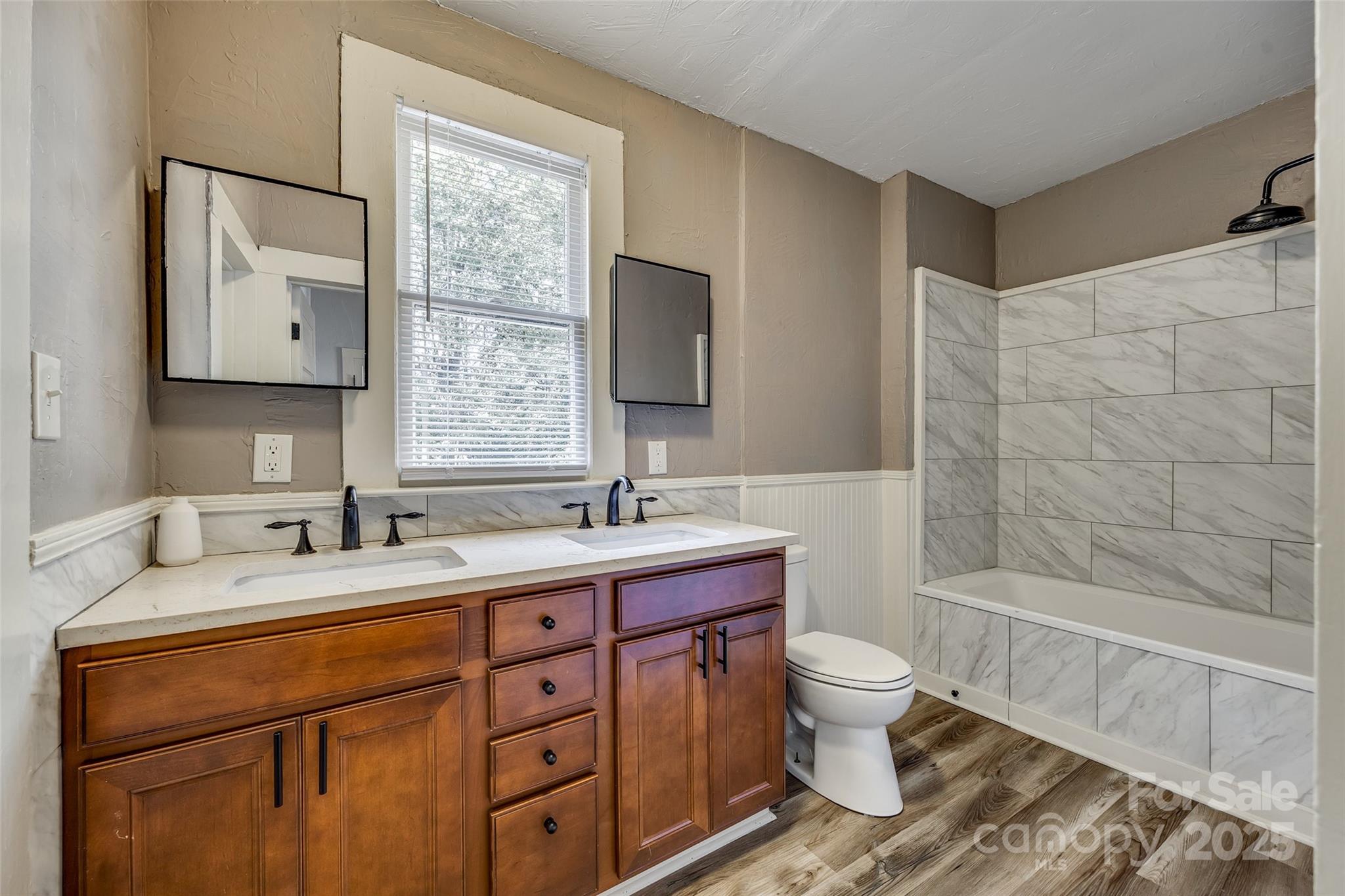 203 Kings Mountain Street Clover, SC 29710 - Photo 16 of 35 a bathroom with a granite countertop sink toilet and mirror