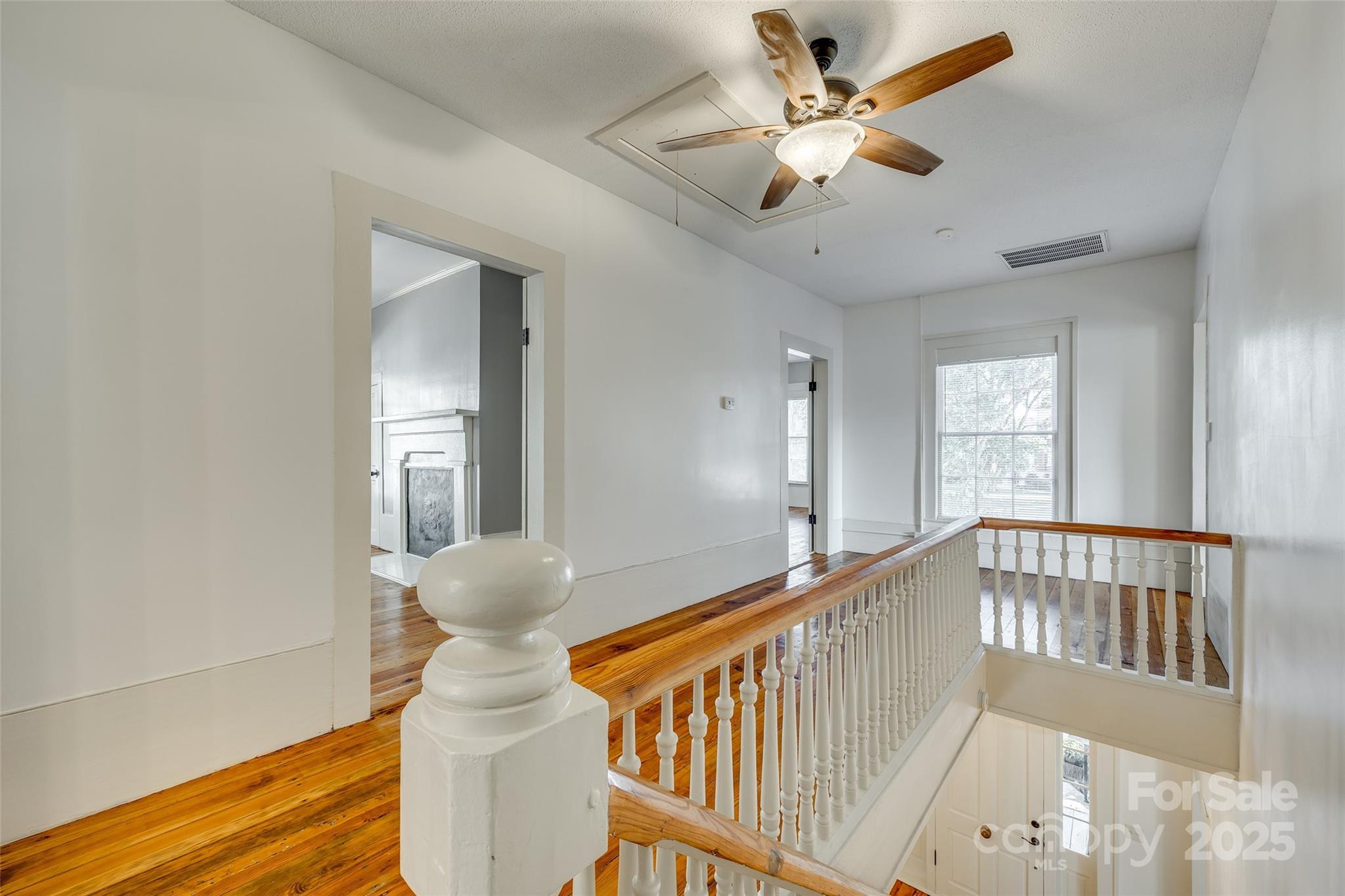 203 Kings Mountain Street Clover, SC 29710 - Photo 19 of 35 a view of entryway and hall with wooden floor