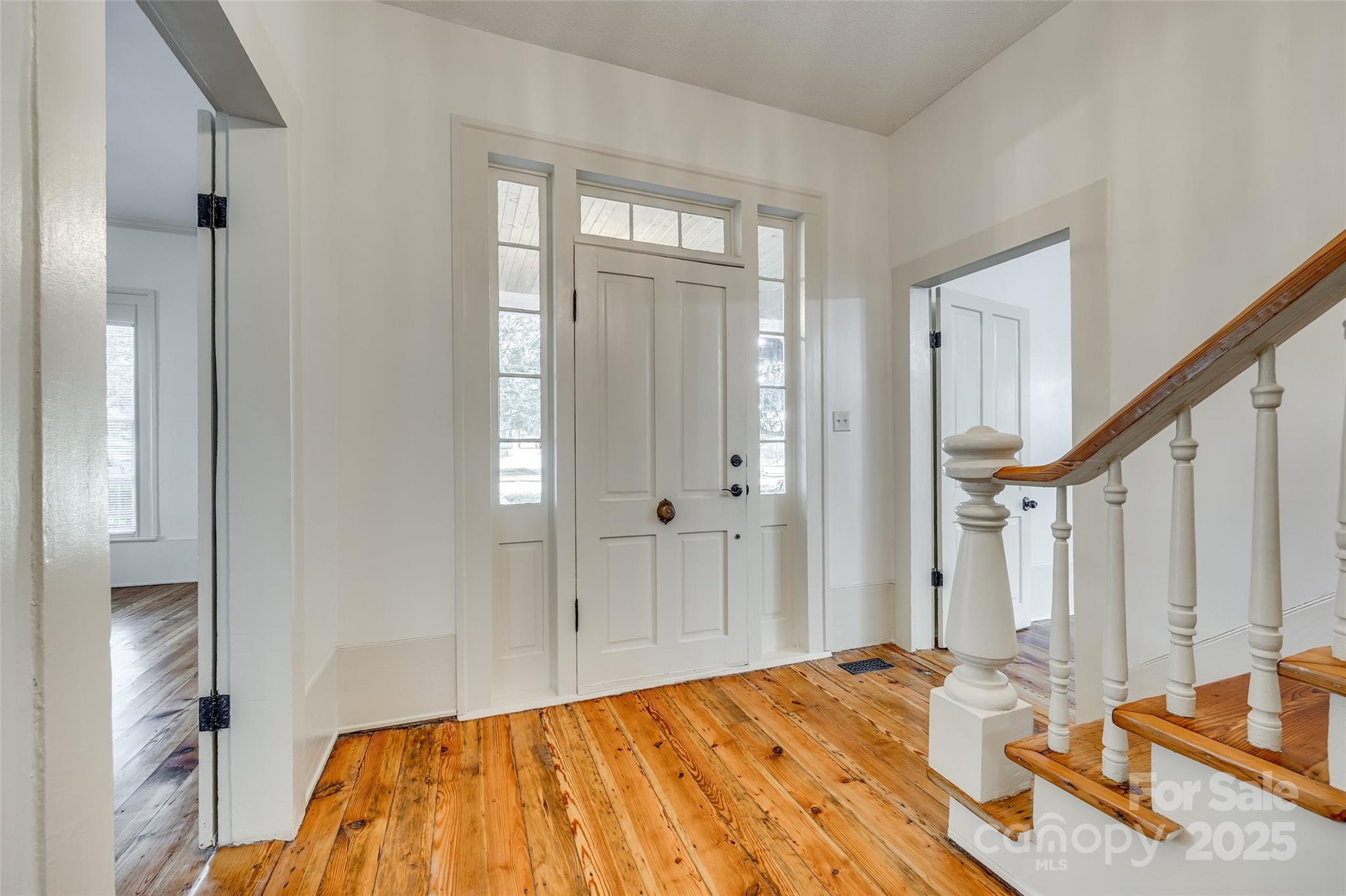 203 Kings Mountain Street Clover, SC 29710 - Photo 5 of 35 a bed room with a bed and a mirror
