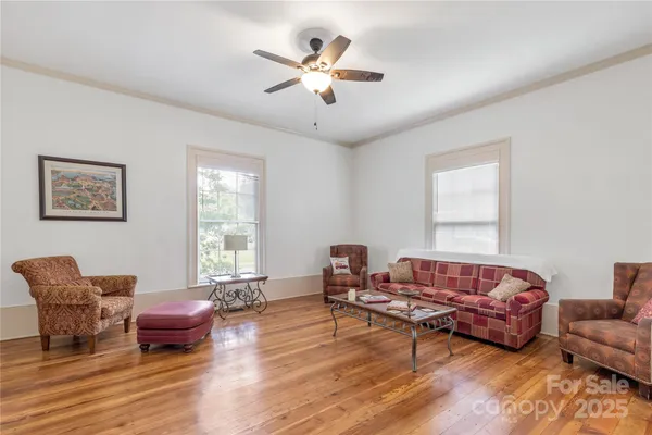 a living room with furniture or couch and a window