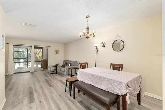 a bedroom with a bed and cabinets