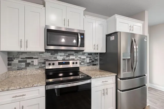 a view of a room that has a window in it