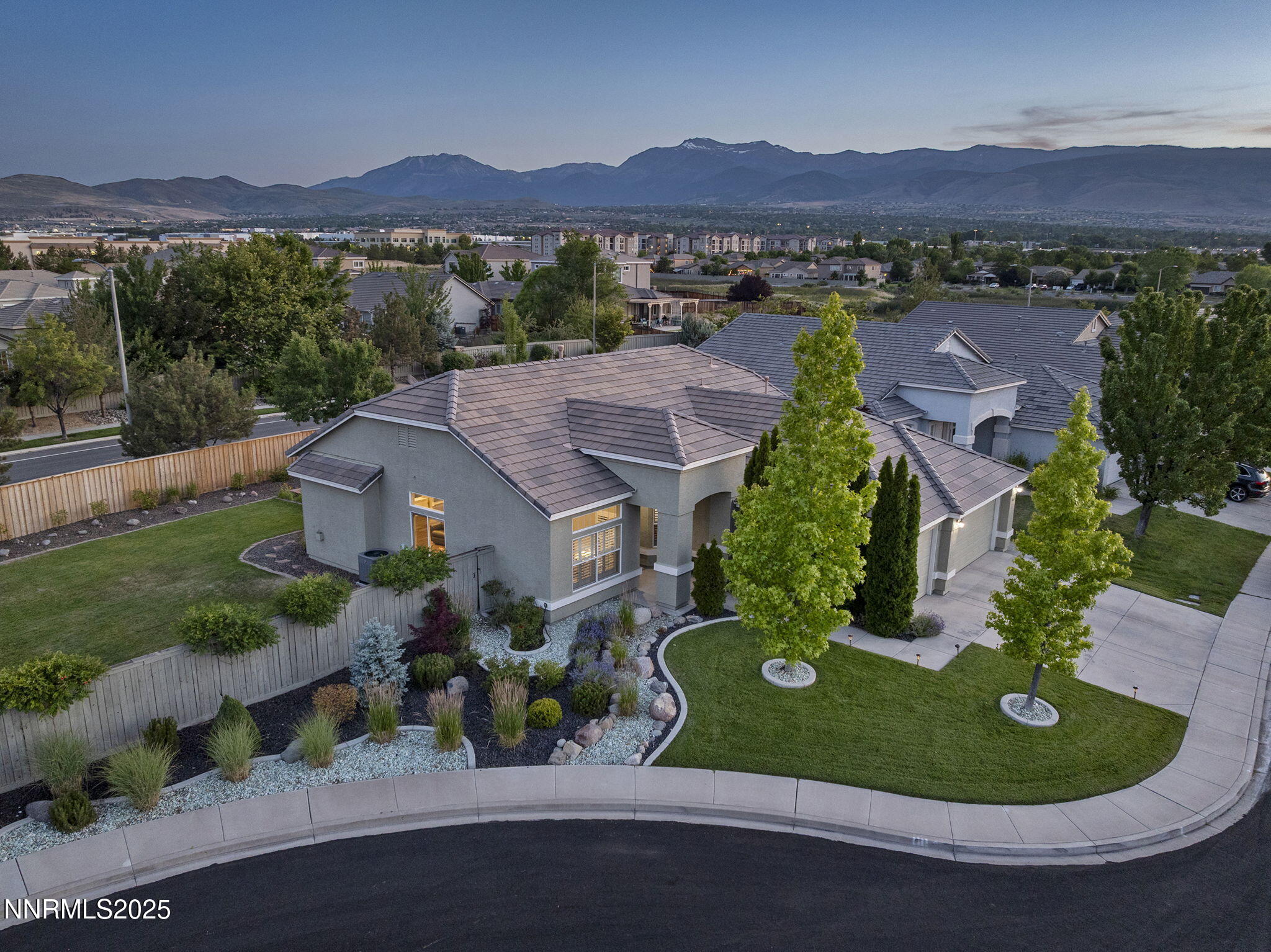 1660 Murrieta Court Reno, NV 89521 - Photo 1 of 39 an aerial view of a house with garden space and mountain view