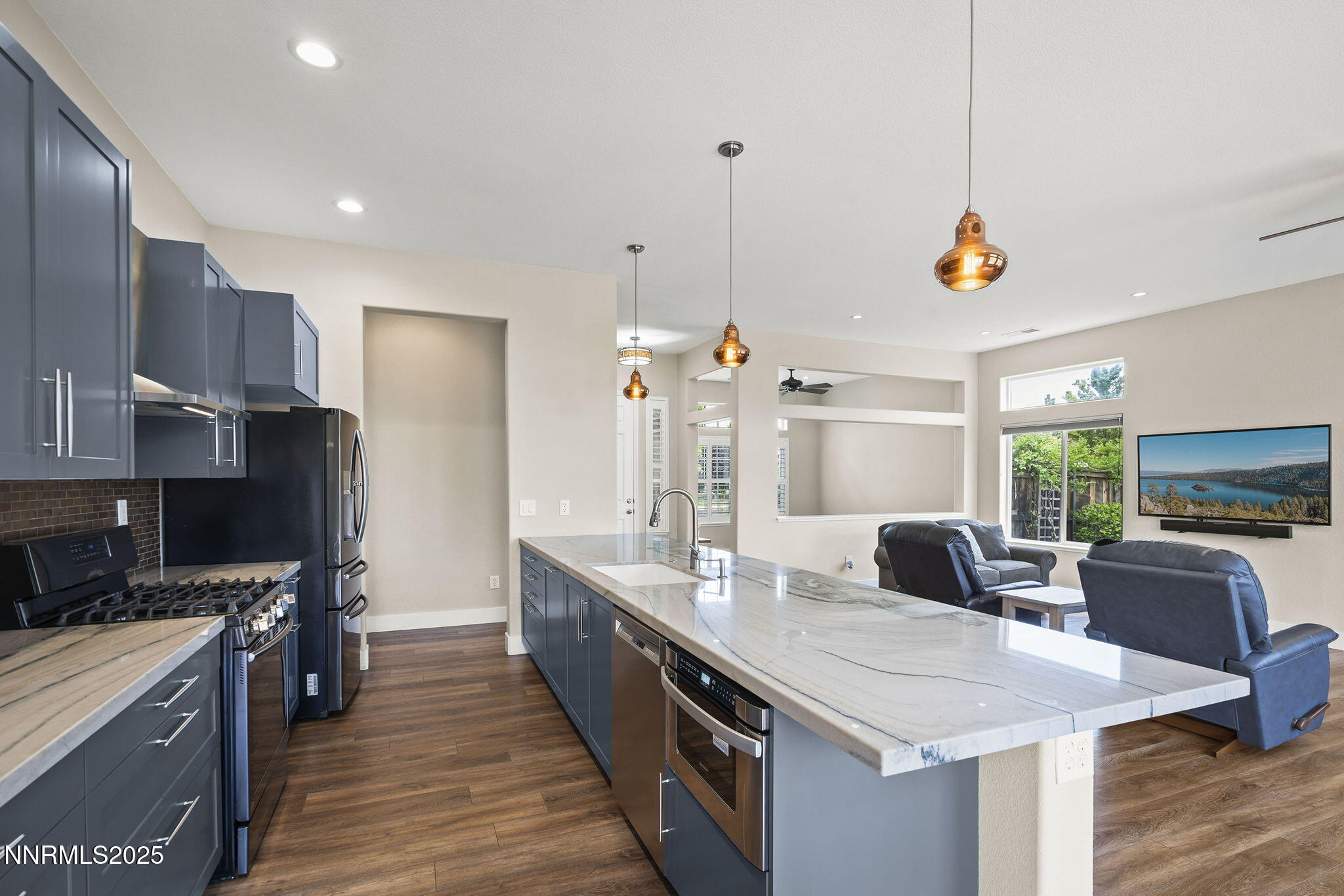 1660 Murrieta Court Reno, NV 89521 - Photo 14 of 39 a kitchen with granite countertop a sink appliances and cabinets