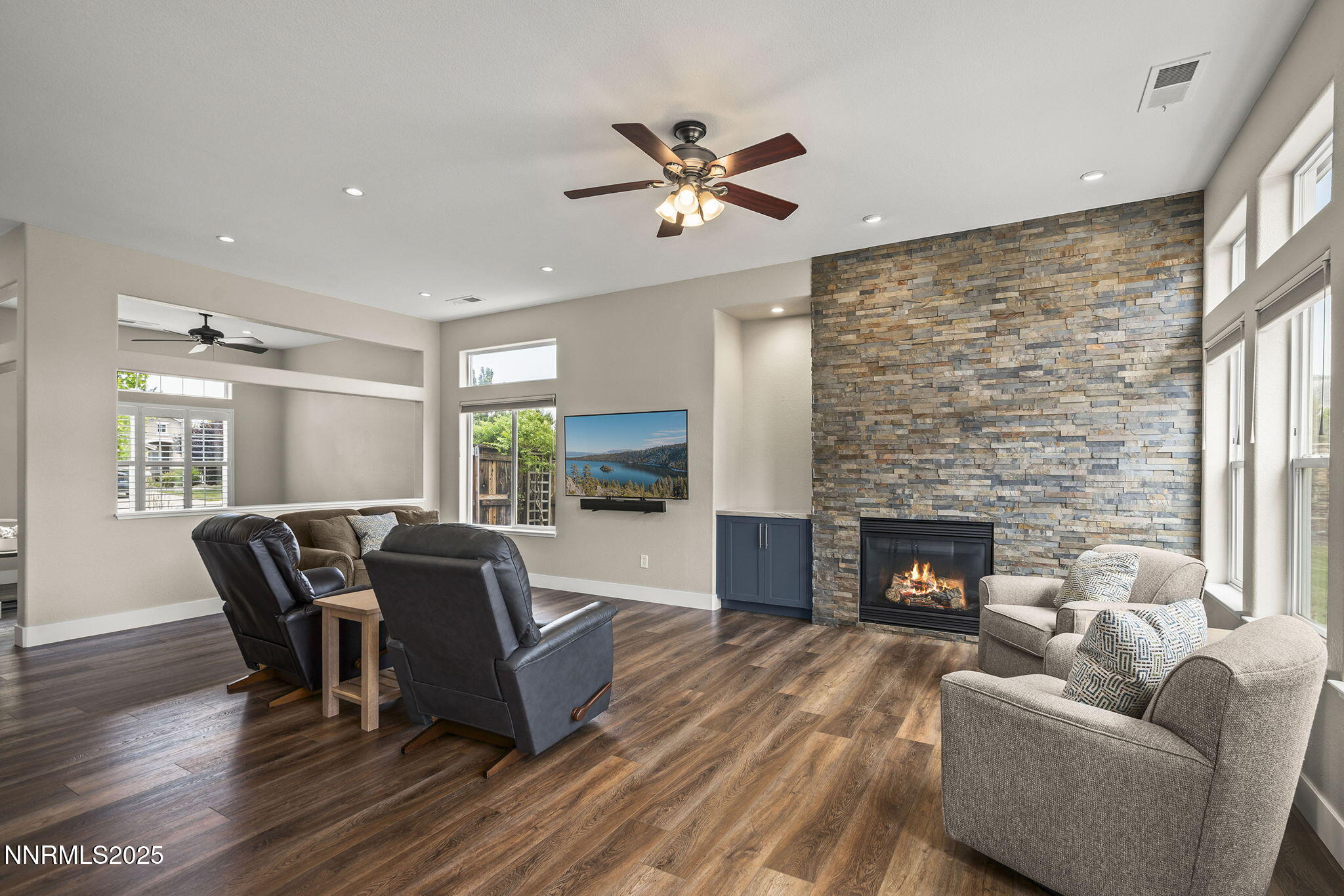 1660 Murrieta Court Reno, NV 89521 - Photo 17 of 39 a living room with furniture and a fireplace