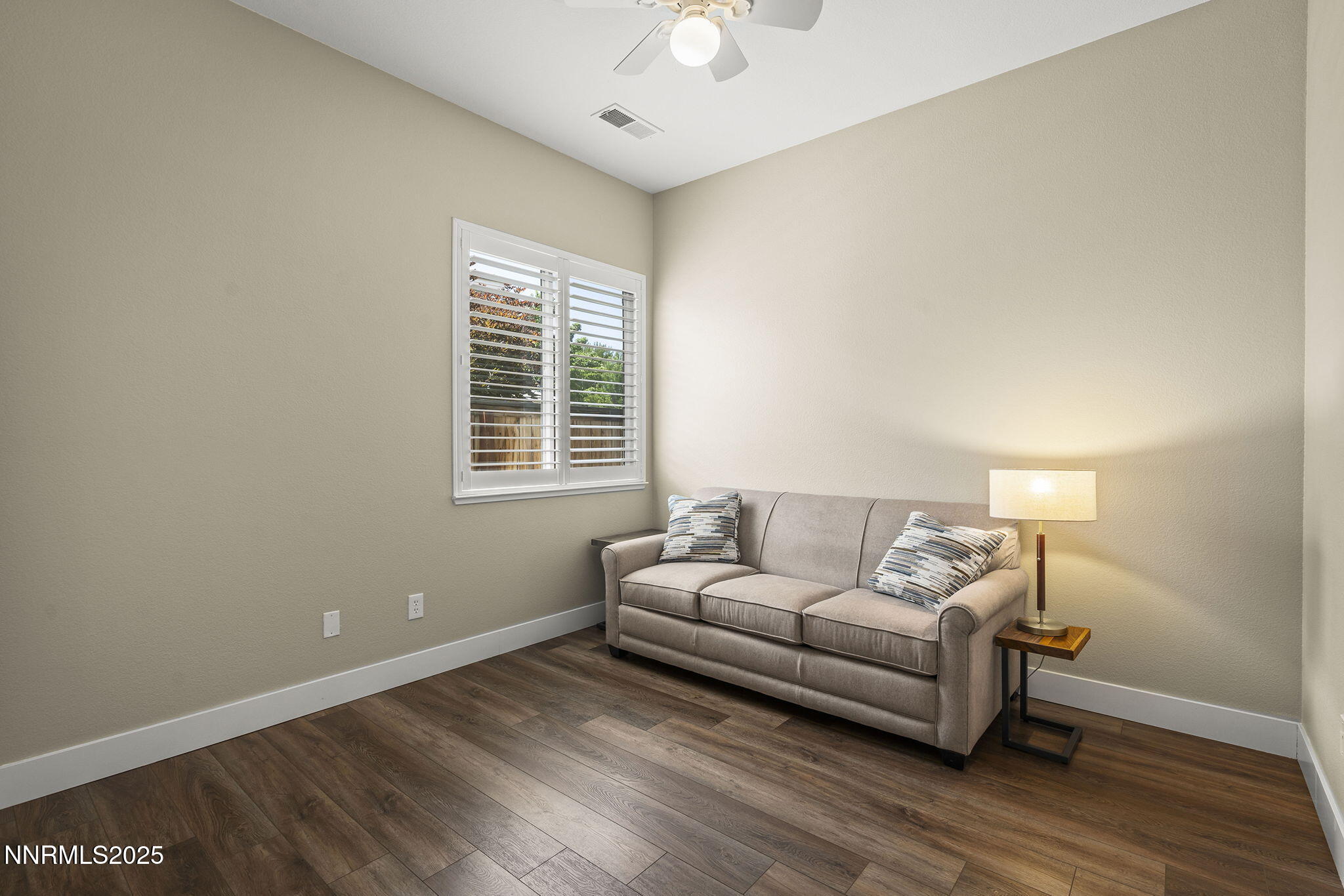 1660 Murrieta Court Reno, NV 89521 - Photo 21 of 39 a living room with furniture and a large window
