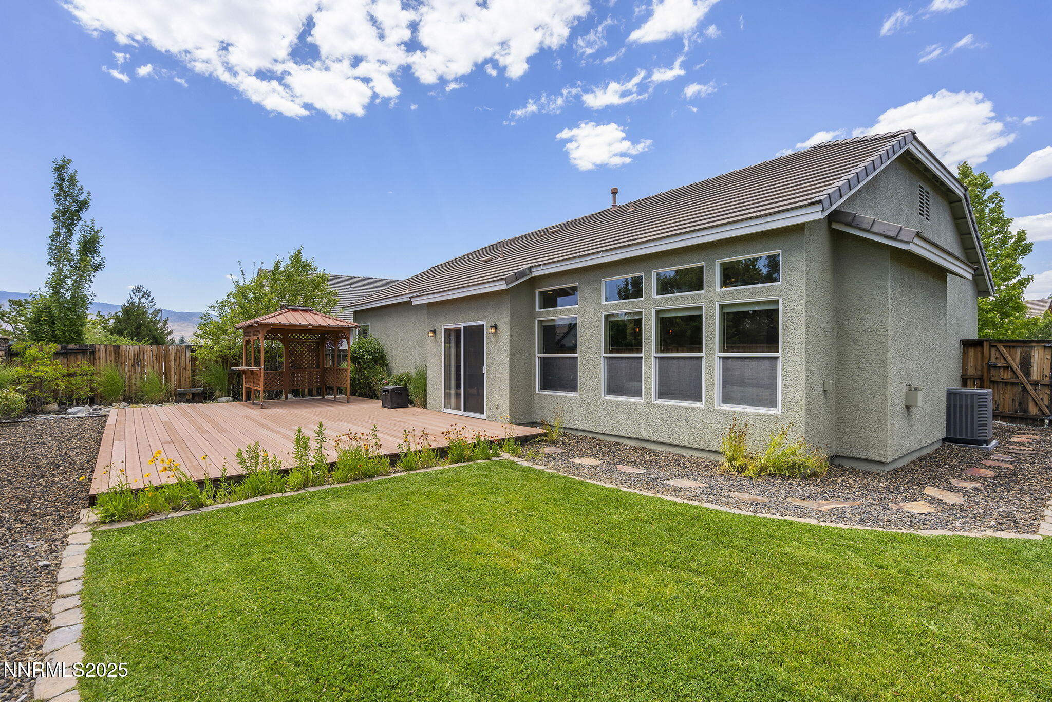 1660 Murrieta Court Reno, NV 89521 - Photo 28 of 39 a view of a house with backyard and sitting area