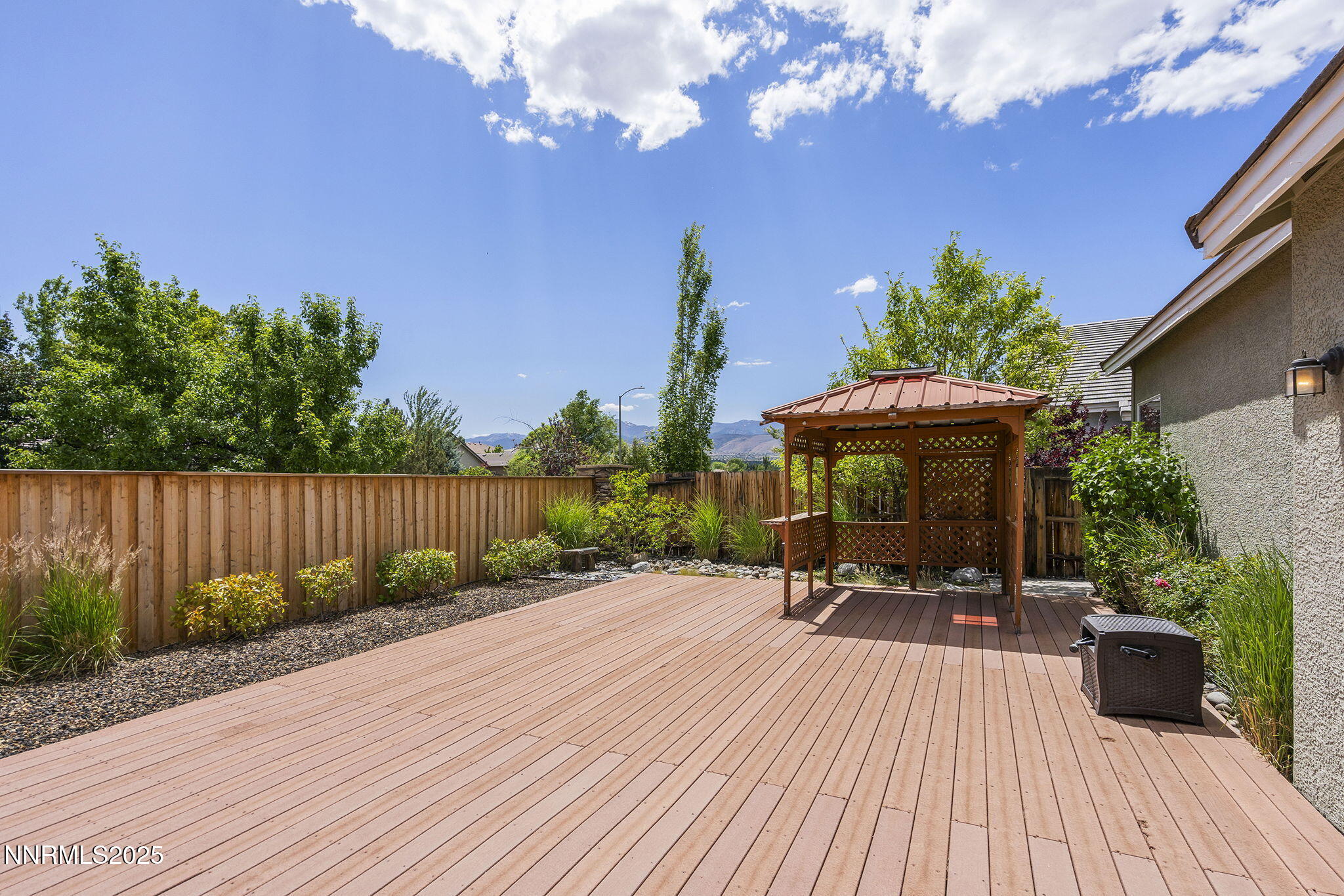 1660 Murrieta Court Reno, NV 89521 - Photo 30 of 39 a view of a backyard with sitting area