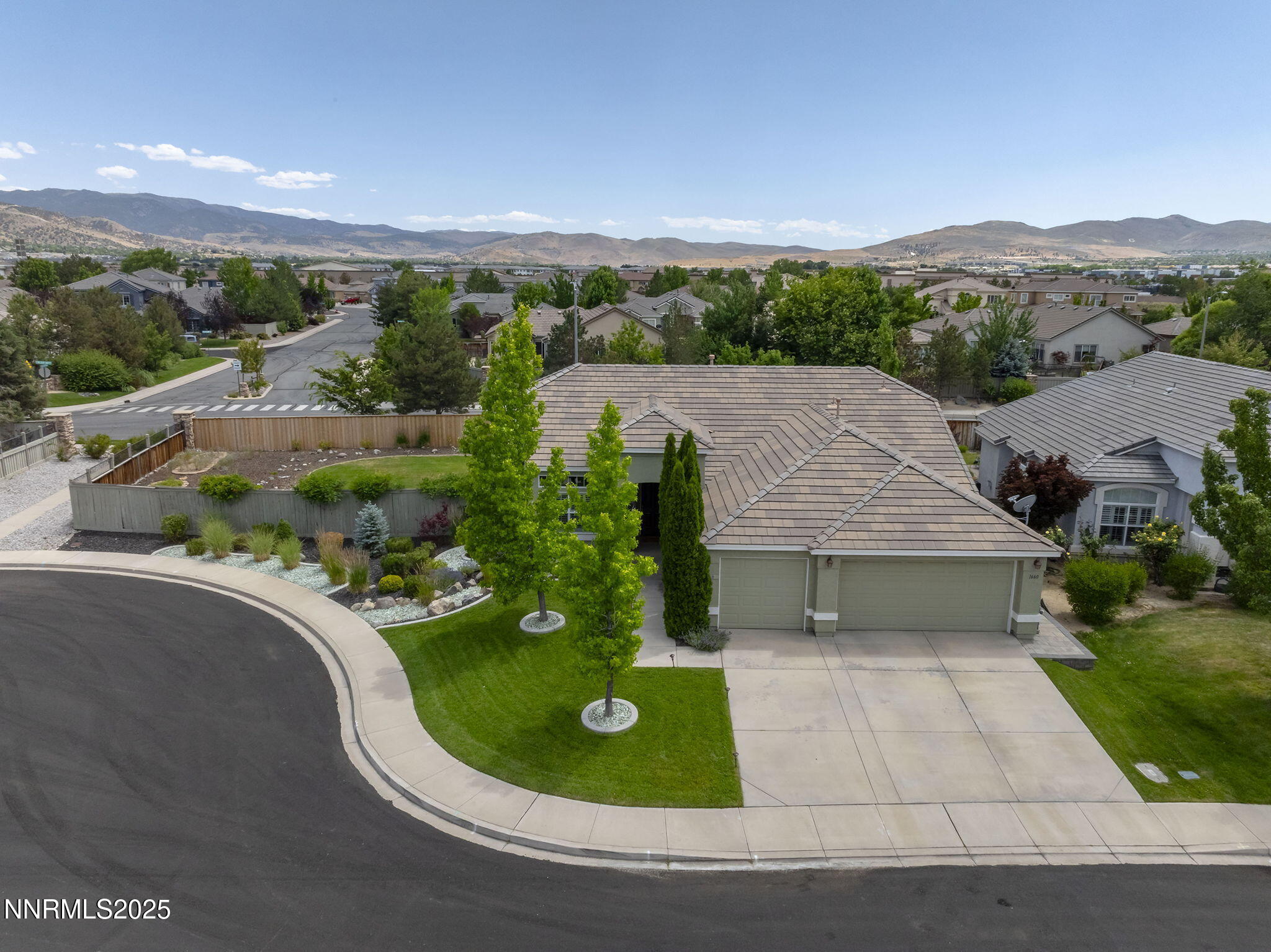 1660 Murrieta Court Reno, NV 89521 - Photo 34 of 39 a view of a terrace with a garden and yard