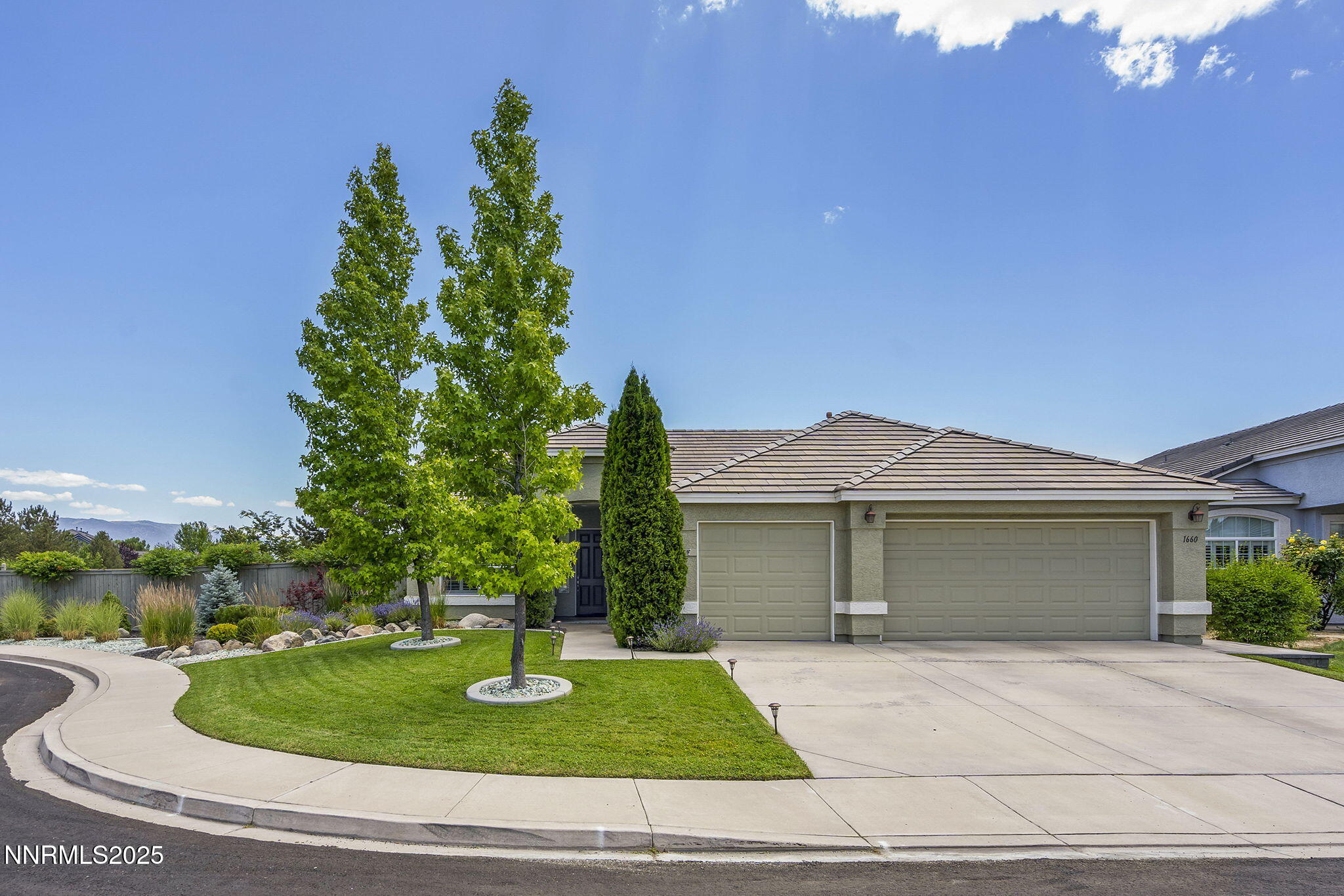 1660 Murrieta Court Reno, NV 89521 - Photo 37 of 39 front view of a house with a yard