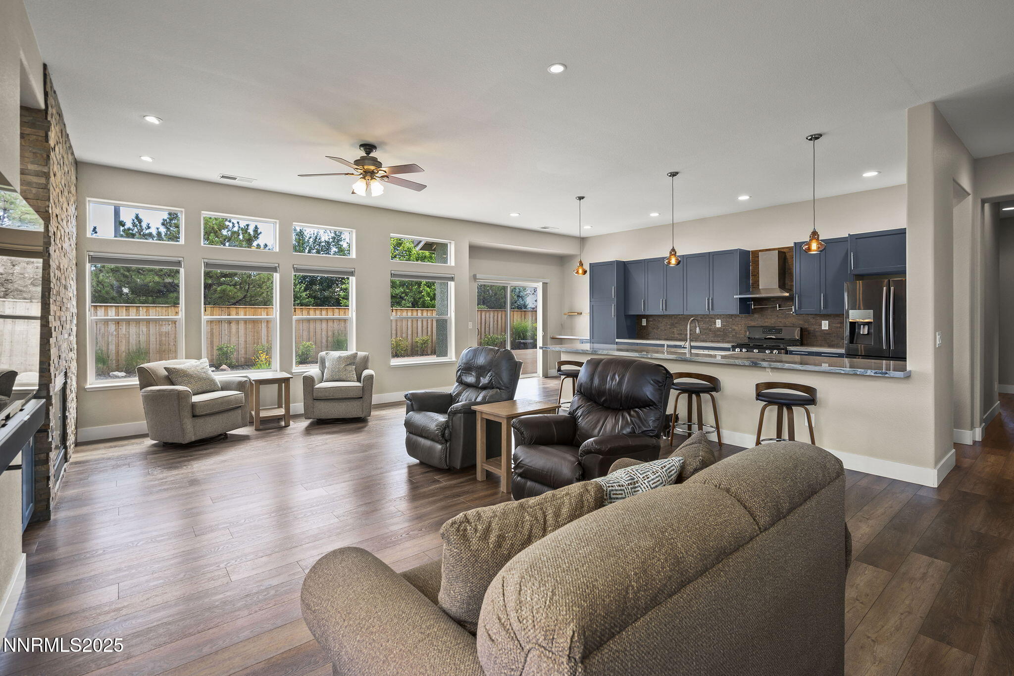 1660 Murrieta Court Reno, NV 89521 - Photo 10 of 39 a living room with furniture kitchen view and a large window