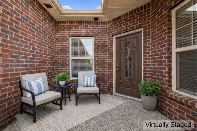 a view of a pathway both side of house